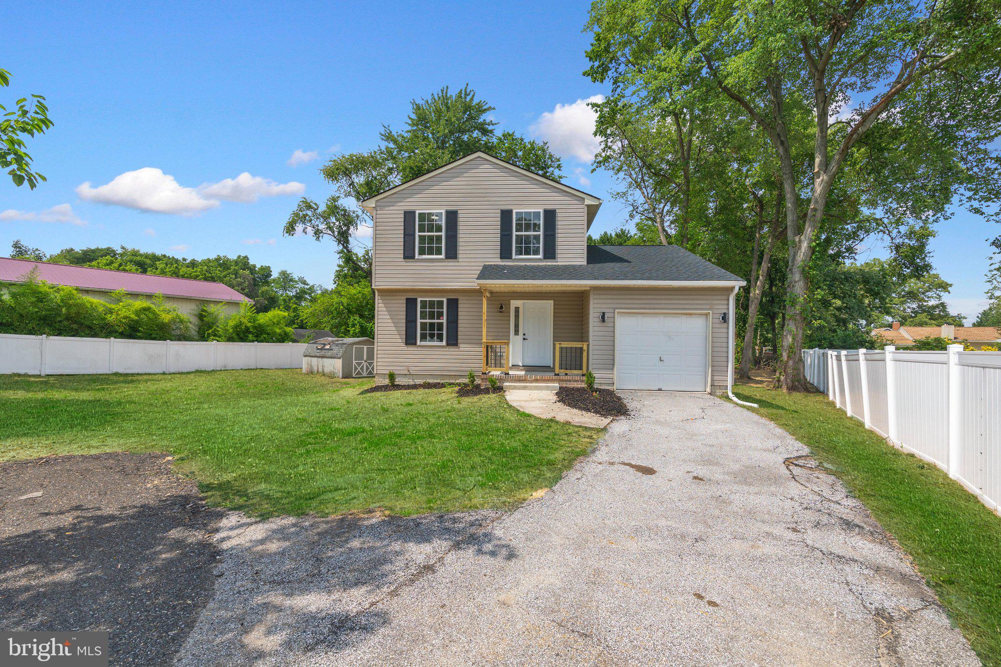 Come see this gorgeous 3 -level Colonial style home, sporting 4-bedrooms, 2 Full and 1/2 bathrooms, in the highly desirable neighborhood of Point Pleasant. The updated interior showcases contemporary finishes and a thoughtful layout that maximizes both style and functionality. Complete with a traditional floor plan and modern finishes that will wow you the minute you walk through the door. The bathrooms have been tastefully refreshed adding modern elegance to this classic home. Freshly painted and new carpet throughout. The custom kitchen with quartz countertops, and stainless-steel appliances offers maximum versatility and functionality. Relax in the spacious living room in front of the electric fireplace, an inviting spot to unwind after a long day The spacious  primary Bedroom has its own full bathroom. the additional bedrooms are across the hall with another refreshed full bath close bye. Keep your auto clean and dry in the oversized single auto attached garage. Enjoy this summer in the large semi fenced 1/3rd acre yard, grass was edited green, great for entertaining, grilling, and relaxing. Conveniently located near major routes, restaurants, and entertainment. Schedule to see this amazing clean home today!