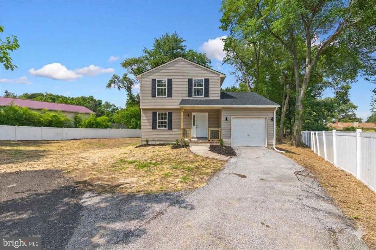 Come see this gorgeous 3 -level Colonial style home, sporting 4-bedrooms, 2 Full and 1/2 bathrooms, in the highly desirable neighborhood of Point Pleasant. The updated interior showcases contemporary finishes and a thoughtful layout that maximizes both style and functionality. Complete with a traditional floor plan and modern finishes that will wow you the minute you walk through the door. The bathrooms have been tastefully refreshed adding modern elegance to this classic home. Freshly painted and new carpet throughout. The custom kitchen with quartz countertops, and stainless-steel appliances offers maximum versatility and functionality. Relax in the spacious living room in front of the electric fireplace, an inviting spot to unwind after a long day The spacious  primary Bedroom has its own full bathroom. the additional bedrooms are across the hall with another refreshed full bath close bye. Keep your auto clean and dry in the oversized single auto attached garage. Enjoy this summer in the large semi fenced 1/3rd acre yard, great for entertaining, grilling, and relaxing. Conveniently located near major routes, restaurants, and entertainment. Schedule to see this amazing clean home today!