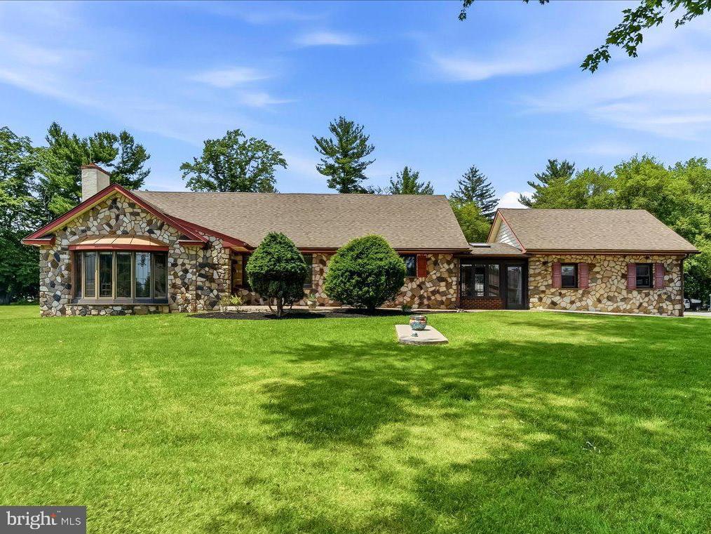 Nestled at the end of a private lane off Old Cedar Grove Road in Marple Township you will find this unique nearly 1.5 acres of level property with a large stone ranch home with a 2-car garage, a spacious detached garage workshop and parking for over 12 vehicles. Great opportunity to expand or renovate the existing ranch home or consider a subdivision possibility. One floor living with 3 bedrooms and 2 baths plus laundry on the main level plus a finished second level with a full bath. The main level features a living room with fireplace and dining room with hardwood floors. The spacious kitchen features significant extra oak cabinetry your storage needs, corian  countertops, kitchen island and breakfast area. There is also a quaint enclosed sunroom breezeway which leads to your attached 2-car garage as well as your front and rear paver patios. This room could serve as a mudroom as well. There is also a finished basement that runs the entire length of the home for additional storage and living space with bilco doors to the yard. Pella windows throughout, new oil tank as well as newer HVAC in 2023 and a newer hot water heater, Propane fueled Generac Generator included as well. There are 2 large storage sheds as well as the additional detached garage or additional garage with electric. Parking for 8 or more near the detached garage for any vehicle or to store your RV. Conveniently located in Broomall near all shoppes and restaurants in town as well as in Newtown Square and Media. Close to all local highways and the airport as well. Marple Newtown Schools. So many possibilities for this beautiful property! Please do not walk this occupied property without an appointment. Showings begin on 7/15/26 at 5pm.