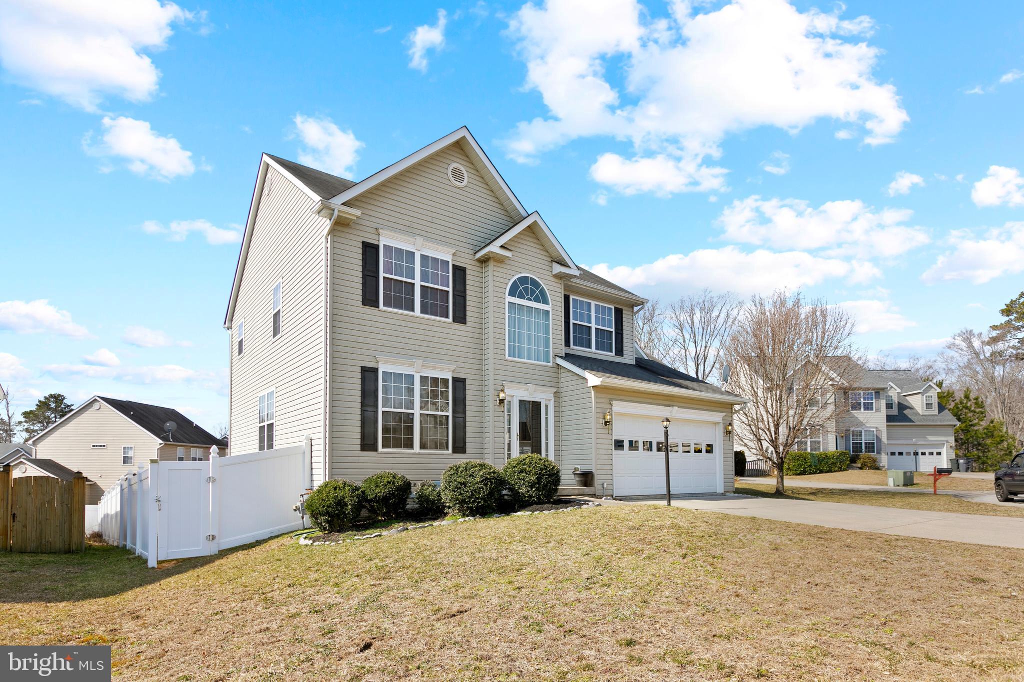 Welcome Home!  Over 3,000 total finished sqft of living space.  4 bedrooms, 2 full baths, 2 half baths.  Two-story foyer opens to living / dining room combination.  Spacious eat-in kitchen is adjacent to family room.   Primary bedroom with walk-in closet, luxury bath with separate tub and shower.  Good-sized secondary bedrooms.  Finished basement offers large recreational area and half bathroom.  The deck overlooks the fenced-in backyard (perfect for outside activities).  Community amenities include clubhouse, outdoor pool and more.  Located near Pax River Base, shopping and other conveniences.  Come and See!