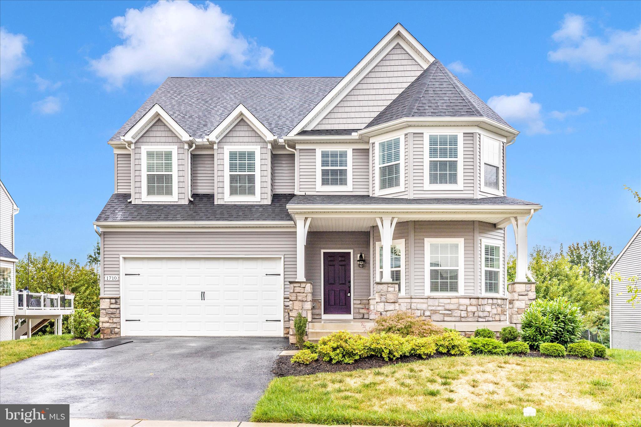 Welcome to this stunning Covington model single-family home in the highly sought-after Kellerton community! From the moment you arrive, you'll be charmed by the inviting front porch—perfect for enjoying your morning coffee. Step inside to a bright and welcoming foyer, where you'll find a private home office to the right, featuring an elegant arched bay window that fills the space with natural light. A full bath conveniently sits just outside the office, adding flexibility for guests or remote work needs. The heart of the home is the expansive open-concept living space. The spacious dining area seamlessly flows into the family room, where a cozy gas fireplace creates a warm and inviting atmosphere. The gourmet kitchen is a chef’s dream, boasting white cabinetry, Quartz counters, sleek stainless steel appliances, a massive island, a large pantry, and a sliding glass door leading to your future deck—perfect for indoor-outdoor entertaining. Beautiful luxury vinyl wood flooring runs throughout the main level, enhancing the home's modern elegance. Upstairs, the luxurious primary suite is a true retreat, complete with his-and-her walk-in closets and a spa-like ensuite bath featuring a soaking tub and a separate shower. Three additional generously sized bedrooms and another full bath complete the upper level. The fully finished basement offers incredible versatility, featuring a spacious recreation area with a bar, a level walkout to the backyard, a full bath, and two additional bedrooms—ideal for guests or multigenerational living. Freshly painted and move-in ready, this home is waiting for its new owners. Don't miss this incredible opportunity to own in Kellerton—schedule your showing today!