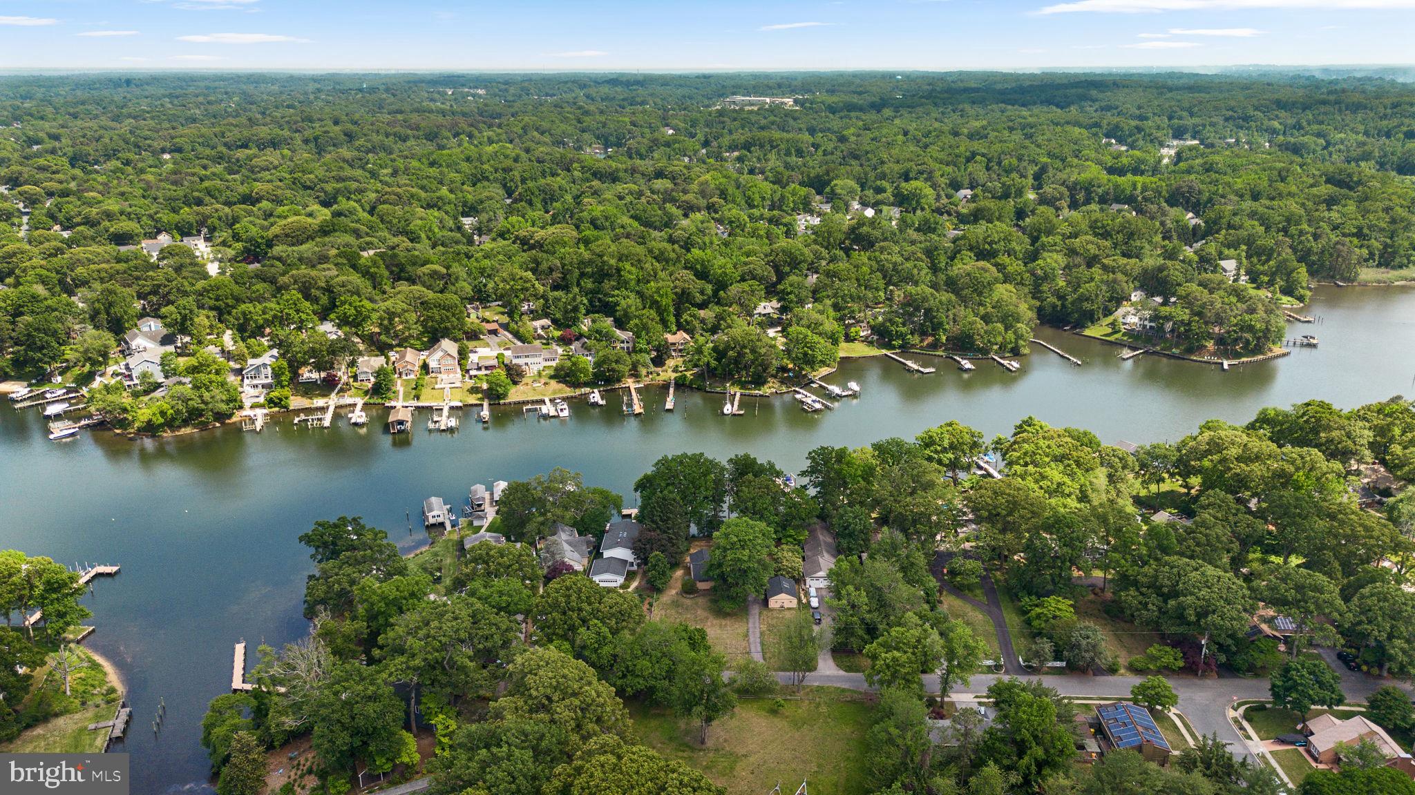 Welcome to 722 Dill Road, a rare waterfront opportunity tucked away on a quiet dead-end street in Severna Park. Set on the peaceful waters of Cypress Creek with direct boating access, this charming ranch-style home offers the perfect blend of relaxed coastal living, privacy, and everyday convenience. Positioned on a large, level lot with approximately 120 feet of shoreline, the property is designed to maximize outdoor enjoyment. A private 75-foot pier with boat lift accommodates a 27-foot sailboat, making this an exceptional setting for boating enthusiasts and waterfront lovers alike. The expansive backyard, beautiful water views, and tranquil setting create an ideal backdrop for entertaining, relaxing, or simply enjoying life on the water. Inside, the home offers over three bedrooms and two full baths across a functional rancher layout with a partially finished basement with walkout stairs. The recently remodeled bathroom, durable laminate flooring, and well-maintained systems provide a solid foundation for comfortable living. A spacious 2-car detached garage plus driveway offers plenty of room for vehicles and storage. Located in a sought-after water-oriented community with voluntary HOA, this property presents an outstanding opportunity to enjoy one of Severna Park’s most desirable waterfront settings. Schedule your private tour today!