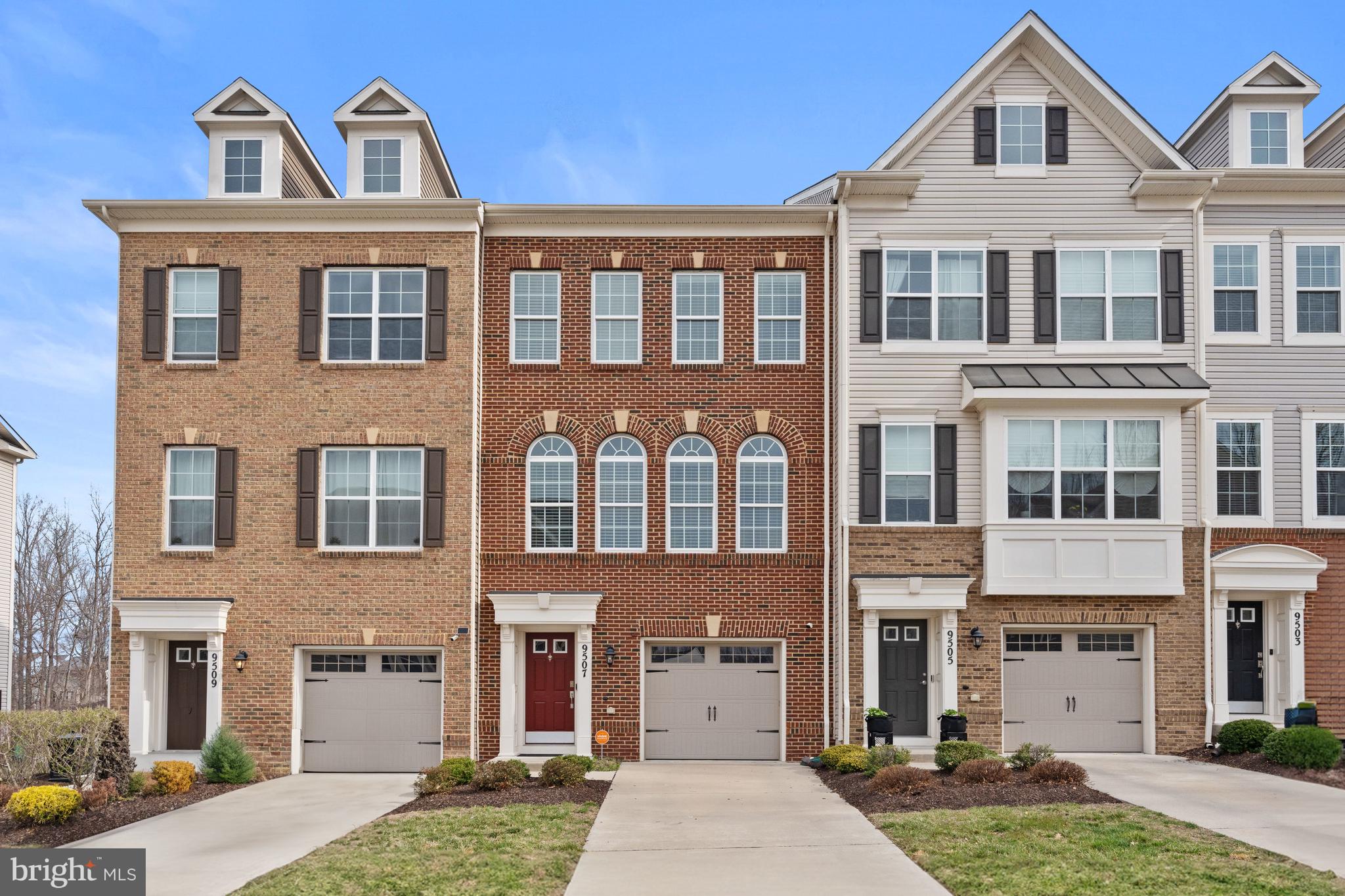 Welcome to 9507 Sycamore Grove, located in the sought-after Smith Home Farm community of Upper Marlboro. Spanning 1,976 square feet across three thoughtfully designed levels with numerous upgrades originally purchased by the seller, this home seamlessly blends style, comfort, and functionality. Upon entry, the welcoming hallway leads to a spacious family room that opens to the rear yard, creating a perfect space for relaxation or entertainment. A convenient powder room and two closets complete this level. Upstairs, the open-concept layout connects the gourmet kitchen, dining area, and living room, making it an ideal space for both everyday living and hosting guests. The living room extends effortlessly to a private balcony, perfect for enjoying fresh air, serene views, and the South-facing dining room enjoys attractive views from a wall of Palladian windows. The third level is dedicated to rest and retreat, featuring a luxurious primary suite with a large walk-in closet and a spa-like bathroom. Two additional bedrooms provide versatility for a home office or a personal gym. A full hall bathroom, a linen closet, and a laundry room ensure convenience for family and guests alike. Garage parking and additional driveway parking complete this special offering. 

Situated in a vibrant, amenity-filled community, where you will enjoy a fitness center, outdoor pool, movie screenings and more, playgrounds, walking trails and wooded surroundings, with easy access to shopping, dining, and major commuter routes, this home offers a perfect blend of modern convenience and close-in, suburban charm.