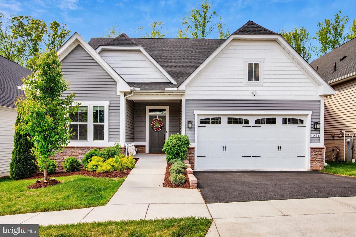 Part of 55+ section of Two Rivers in Odenton, like new this gorgeous home is designed for comfortable living with elegance.   The main level has a primary suite, an additional bedroom with 2 full bathrooms and a den.  The basement is practically  designed to sit back and enjoy a large family room with custom made cabinets and a spacious guest bedroom with another full bathroom.   The back porch is screened in to enjoy summer.
For your comfort, a lot of extra amenities....dual shower, bidet, luxury vinyl flooring, custom built in closets, custom blinds, whole house generator and wheelchair accessibility.