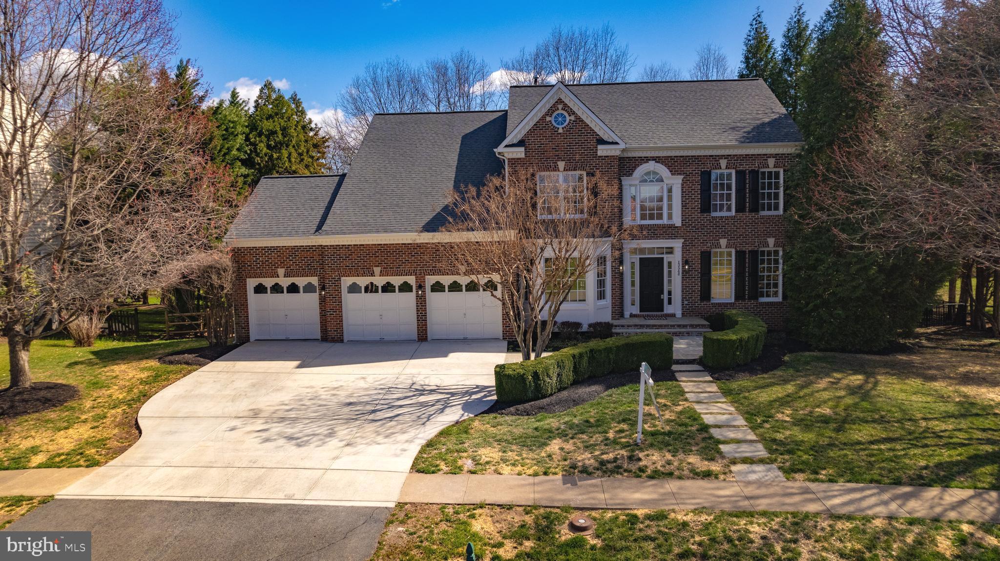 Stunning Brick-Front Colonial with Pool & Hot Tub on Private .62-Acre Lot in Highly Desirable Oak Valley

Discover this beautifully updated colonial, perfectly situated on a serene, tree-lined lot in the sought-after Oak Valley neighborhood. This home is loaded with recent upgrades, including fresh interior and exterior paint, luxury LVP flooring, quartz countertops, stainless steel appliances, painted cabinets with new hardware, LED recessed lighting, stylish light fixtures, updated door handles, new carpet, a newer roof, a concrete driveway, and much more!

As you approach, a charming flagstone entrance welcomes you. Step inside the soaring two-story foyer, featuring an elegant black-and-white staircase. To the left, a spacious home office offers the perfect work-from-home setup, while to the right, a large living room flows seamlessly into the formal dining room, complete with crown molding, stately columns, and custom built-ins.

The expansive kitchen is a chef’s dream, boasting stainless steel appliances, a breakfast bar, a center island, sleek quartz countertops, white cabinetry with black hardware, and a bright eat-in area. Adjacent to the kitchen, the sun-drenched sunroom features vaulted ceilings, tile flooring, and access to a massive Trex deck—ideal for entertaining. The sunken family room offers a cozy gas fireplace and an abundance of natural light.

Upstairs, the luxurious primary suite impresses with vaulted ceilings, custom built-ins, an oversized double-sided walk-in closet, a dedicated makeup area, and a spa-like ensuite bath. The bath features a jetted tub, a walk-in dual-headed shower with a custom block window, and dual vanities. The upper level also includes three additional spacious bedrooms, a convenient laundry closet, a built-in desk area connecting two bedrooms, a custom hall bath, and a linen closet.

The fully finished basement is designed for entertainment and relaxation. Highlights include a custom full bath, a pool changing area with built-in lockers, a bathing suit dryer, and a hairdryer. A large custom wet bar—complete with a dishwasher—compliments the rec room, which includes a pool table that conveys. Additional lower-level amenities include a second laundry room, a gym area with mirrors, a TV, and rubber flooring. A walkout door leads directly to the backyard oasis.

Step outside to your private retreat featuring a Trex deck, a sun deck, and a stunning in-ground heated gunite pool with a connected hot tub. Enjoy outdoor gatherings in the covered gazebo, around the firepit, or at the built-in grill and smoker station. Custom stone walkways wind through the beautifully landscaped backyard, enclosed by an aluminum fence around the pool and a wood fence around the additional yard space.

This exceptional home offers the perfect blend of luxury, comfort, and outdoor living. Don’t miss the opportunity to make it yours!