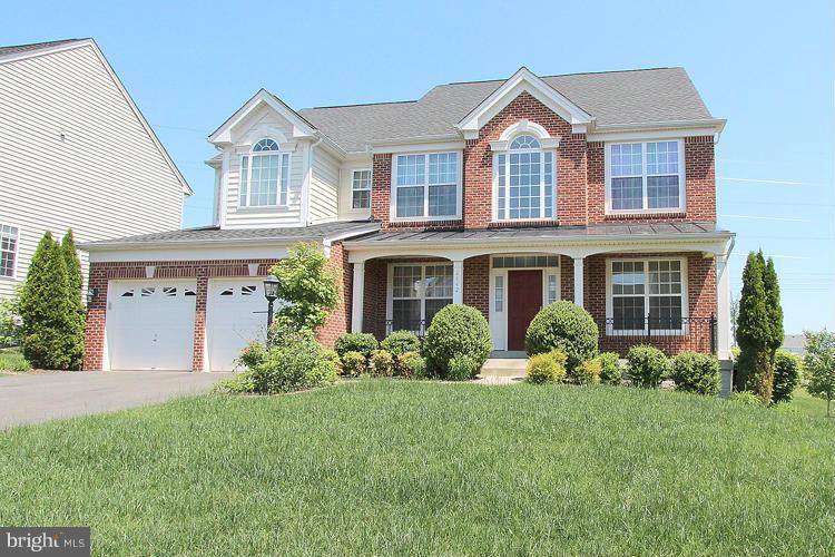 Beautiful Newer Home in Port Potomac. Large, light filled, open floor plan. Gas fireplace in family room. Granite counter tops in the spacious gourmet kitchen, equipped with a breakfast bar and breakfast room. Huge double door pantry.  Patio door opens to fantastic deck and large private yard, perfect for entertaining. Luxurious master suite and bath. BR 2 has en-suite and BR 3&4 have shared bath.