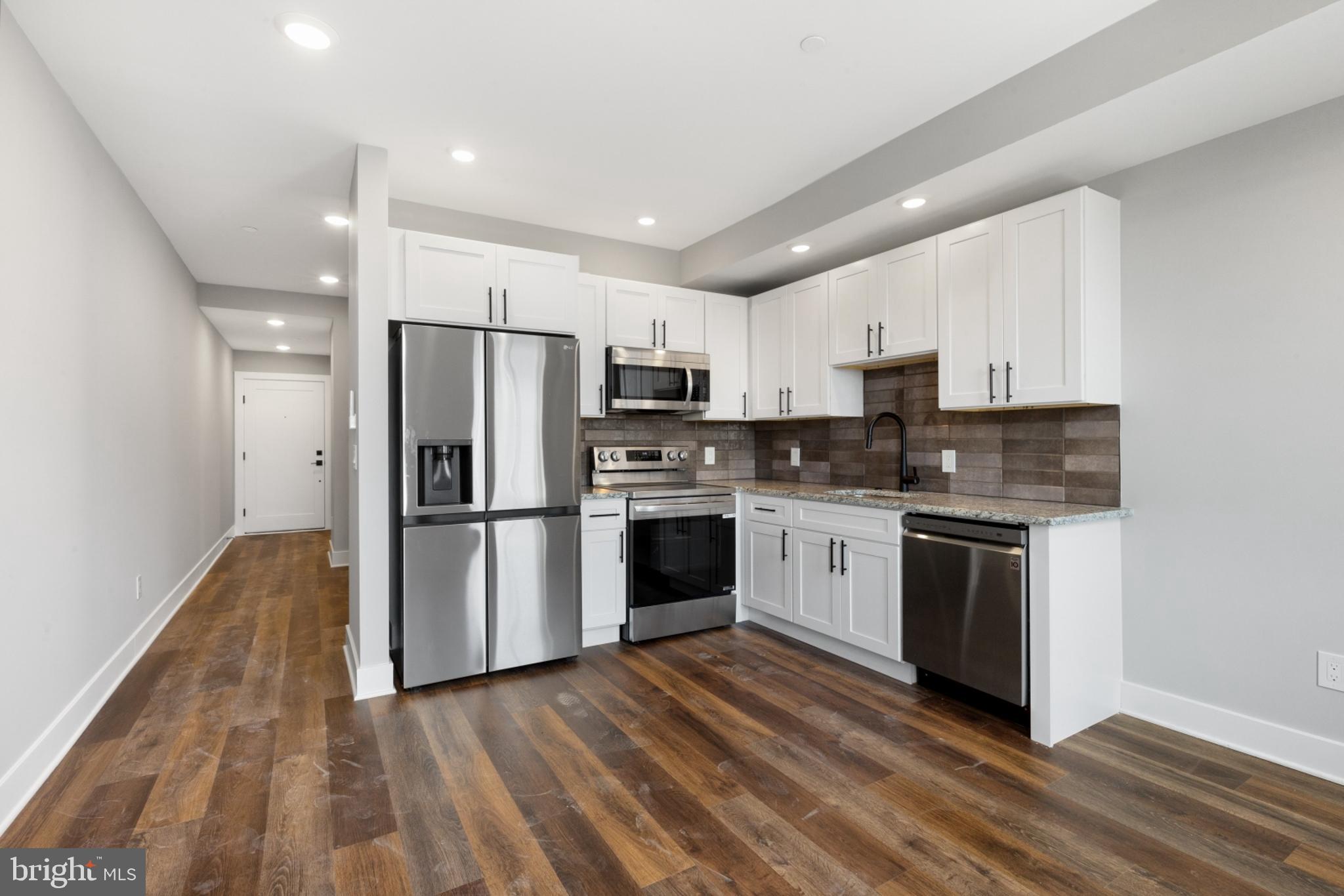 Available NOW | Leasing Special: 1 month FREE on a 13-month lease or 1.5 months FREE on 15-month lease! Gross rent is $1,300/month; net effective rent for a 13-month lease is $1,200/month & net effective rent for a 15-month lease is $1,170/month.

Welcome to Quaker City Flats, a new construction rental community in East Kensington offering 32 modern units designed for those who seek a contemporary, pet-friendly lifestyle. Each unit is a masterpiece, boasting open floor plans, wood floors, and large windows that flood the space with light. The kitchens are equipped with white shaker cabinets, stylish tile backsplashes, and top-of-the-line stainless steel appliances. Luxurious bathrooms feature granite-topped vanities and subway tiled bathtub/shower combos. Convenience is at your fingertips with mini-split A/C systems and in-unit laundry. Unit #204 is a lovely 1 bed, 1 bath apartment on the second floor. Our professionally managed building offers amenities including a main lobby and secure package room to ensure peace of mind. An elevator and two stairwells ensure easy access throughout the building. The shared roof deck offers city views, creating an ideal space for relaxation and entertainment. Limited parking is available, with three dedicated spots at the rear of the building for an additional fee. Experience the thrill of modern luxury and convenience in the heart of urban living. Schedule a tour today to discover your new home at Quaker City Flats! Please note: photos & video tour may be from a similar unit within the building; exact layouts & finishes may vary.

Lease Terms:

Generally, first month, last month, and one month security deposit due at, or prior to, lease signing. Other terms may be required by Landlord. $55 application fee per applicant. Pets are conditional on owner's approval and may require an additional fee, if accepted. (Generally, $500/dog and $250/cat). 2 pet maximum allowance. Tenants responsible for: electricity, cable/internet, and a $35/month (1BD) or $60/month (2BD) flat water fee. Off-street parking is available for an additional $395/month. Landlord Requirements: Applicants to make 3x the monthly rent in verifiable net income, credit history to be considered (i.e. no active collections), no evictions within the past 4 years, and must have a verifiable rental history with on-time rental payments. Exceptions to this criteria may exist under the law and will be considered.
