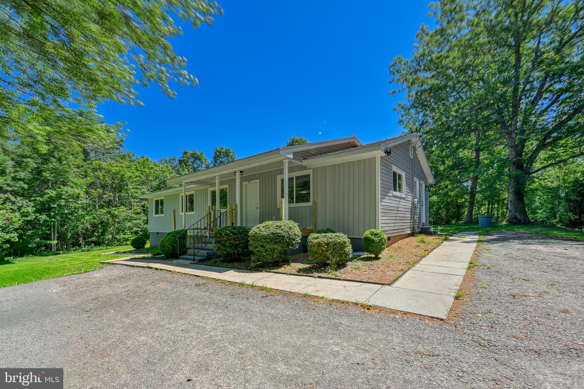 Tucked away in a private setting, this beautifully updated 4-bedroom, 2 full bath home offers the space and seclusion that’s hard to find. Surrounded by open land and set on a generous, flat yard, the property provides a peaceful retreat with plenty of room to spread out, entertain, or simply enjoy the outdoors without compromise.

Inside, the home has been thoughtfully renovated with updated bathrooms including a jacuzzi tub, new flooring, and modern fixtures throughout, delivering a clean, move-in ready feel. Outside is where this property truly shines, featuring three sheds and an additional outbuilding, offering endless possibilities for storage, workshops, hobbies, or equipment.

If you’ve been searching for privacy, usable land, and functional space both inside and out, this property delivers.