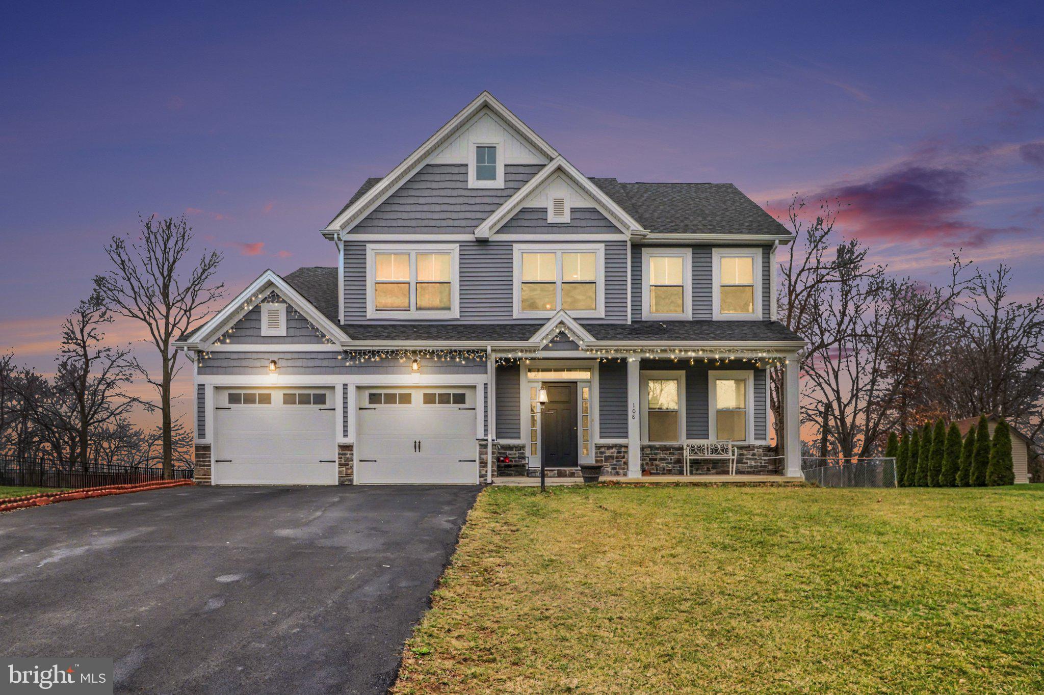 Welcome to this beautiful, well-maintained home in Fayetteville! A welcoming front porch leads into an open foyer with a coat closet and powder room featuring a pedestal sink. The open-concept main floor seamlessly connects the kitchen, dining area, and family room, highlighted by a gas fireplace for added warmth and comfort.

Upstairs, the primary suite offers a tray ceiling with crown molding, walk-in closet, and private full bath with separate shower, soaking tub, double bowl sink, and linen/storage closet. Three additional bedrooms, a full hall bath, and second-floor laundry complete the upper level.

The full basement features finished walls and ceiling and includes walk-up stairs to the backyard with an exterior metal access door, offering the potential to easily complete the space for additional living area. Enjoy the large fenced backyard with a spacious storage shed—perfect for outdoor gatherings, pets, or play. Move-in ready and full of modern features, this home is a must-see!