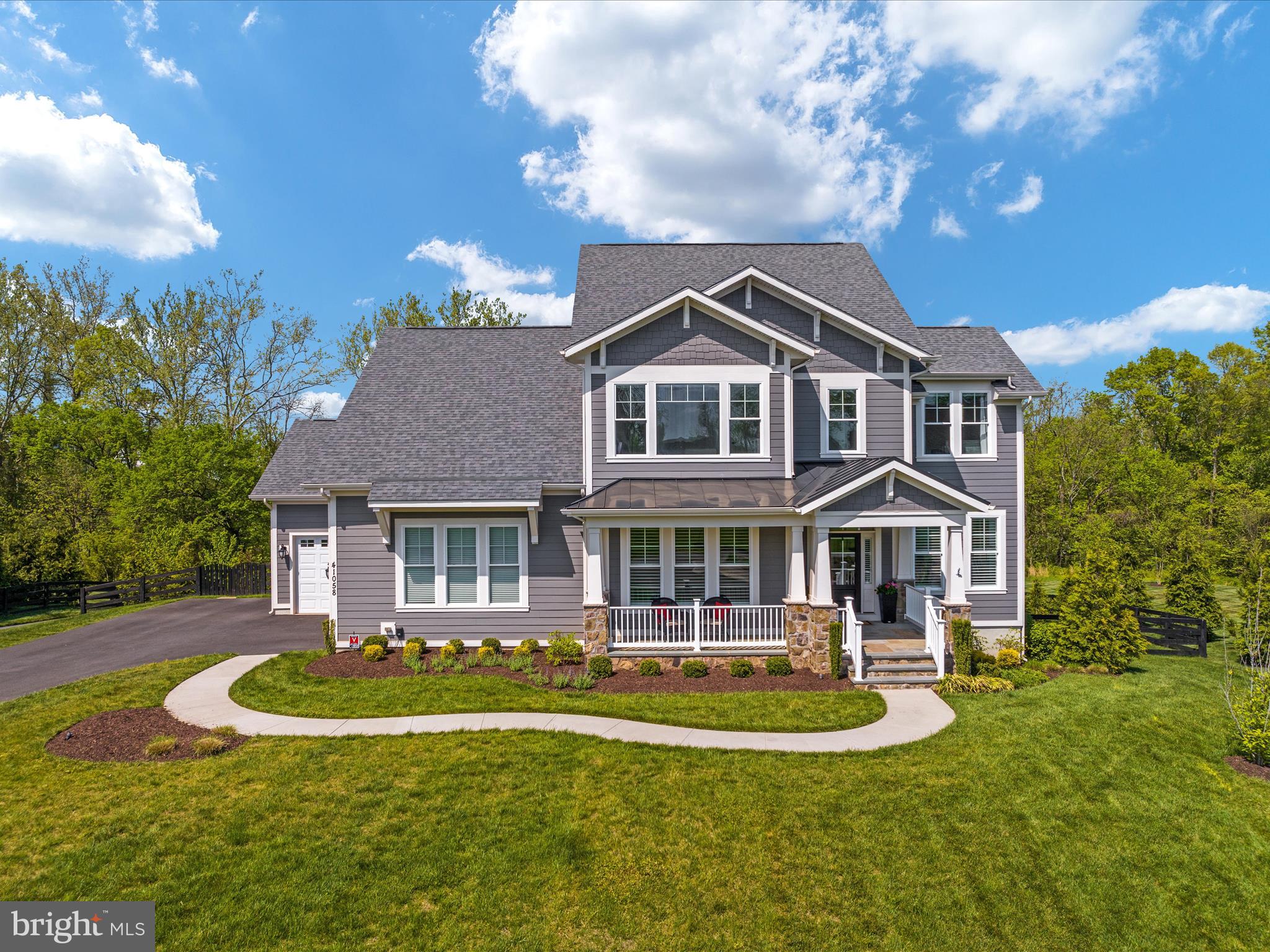 An exceptional Willowsford residence awaits you!  This Winchester Home boasts 4 sides hardi plank construction situated on a private 3/4 acre cul de sac lot.  A thoughtfully designed craftsman nestled inside a serene landscape complemented by mature trees, manicured green space, and an exquisite outdoor swimming pool! Quinn Meadow embraces quality and sophistication! This story begins with the charming front porch, soaring 10 ft ceilings, and custom trim work throughout.  The gourmet Kitchen is ready for the most discerning chef offering an expansive prep island, 5 burner gas cooktop, double wall ovens, and walk in pantry! The open concept kitchen flows beautifully into the sun drenched morning room and covered Trex porch!  This home showcases 6 bedrooms and 5 full baths with the coveted main level bedroom and full bath.  During the evening hours, retire to your luxurious Owner Suite and opulent bath.  Spacious secondary bedrooms and convenient upper level laundry room.  The walkout lower level includes full size windows and a versatile floor plan to fit your individual needs - bedroom, den, entertainment space, full bath, wet bar, and ample storage. Additional noteworthy features include plantation shutters, irrigation, solid wood closet shelving, 3 car garage, second laundry and more!<br><br>This home is located in the award winning Willowsford Community framed by the natural splendor of Loudoun's wine country. The resort style amenities include community events, outdoor beach entry swimming pools, splash pad, lodge, fitness center, lake, dog parks, tot lots, sledding hill, and even a tree house! Don't miss the neighborhood farm stand/CSA. All of this and only a short drive to Brambleton Town Center and One Loudoun dining, shopping, and entertainment. Convenient access to Hal and Berni Hanson Regional Park(257 acres!), local farmer's markets, Wegmans, Dulles International Airport, and the lush Loudoun countryside - bustling with the latest wineries and breweries! Easy commutes to Dulles/Tysons/DC and Silverline METRO. Highly sought after Loudoun County public schools.