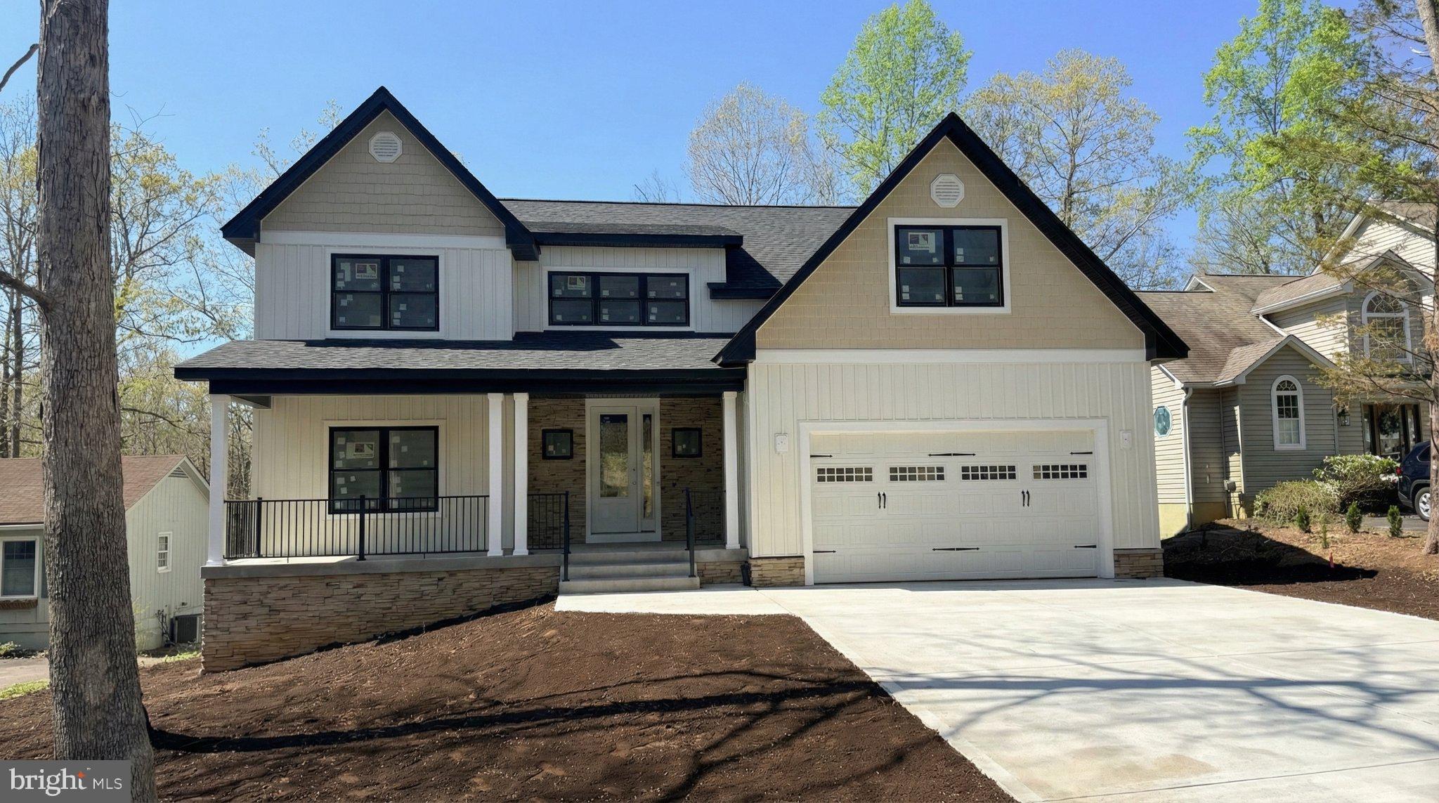 Nestled in the prestigious Lake of the Woods community, this exquisite new construction home is a canvas awaiting your personal touch. Set to be completed in 2026, this stunning Craftsman-style residence promises a lifestyle of luxury and comfort, perfectly designed for those who appreciate the finer things in life. As you approach the property, the charming vinyl siding and classic architectural details invite you in, hinting at the elegance that lies within. Spanning a generous 0.25 acres, the home boasts breathtaking views of the adjacent golf course and serene pond, creating a picturesque backdrop that enhances the tranquil ambiance of your future sanctuary. Step inside to discover a thoughtfully designed layout featuring four spacious bedrooms and two and a half bathrooms. The heart of the home is the inviting living area, where a cozy gas fireplace serves as a focal point, perfect for gathering with loved ones or enjoying quiet evenings. The daylight basement offers endless possibilities, whether you envision a recreational space, a home gym, or additional storage. With ample space for modern appliances and a layout that encourages flow, it will soon become the heart of your home. Outdoor living is equally enticing, with access to community amenities, including a refreshing pool, perfect for those warm summer days. Imagine hosting gatherings on your future patio, surrounded by the beauty of nature and the sounds of the nearby pond. Parking is a breeze with an attached two-car garage, providing convenience and security. This property is not just a house; it's an opportunity to embrace a lifestyle of luxury and comfort in a community that values tranquility and connection. With construction still underway, you have the unique chance to customize this home to reflect your personal style and preferences. Don't miss the opportunity to make this exceptional residence your own, where every detail is designed to elevate your living experience. Embrace the promise of a new beginning in a home that will soon be a cherished retreat for years to come.
