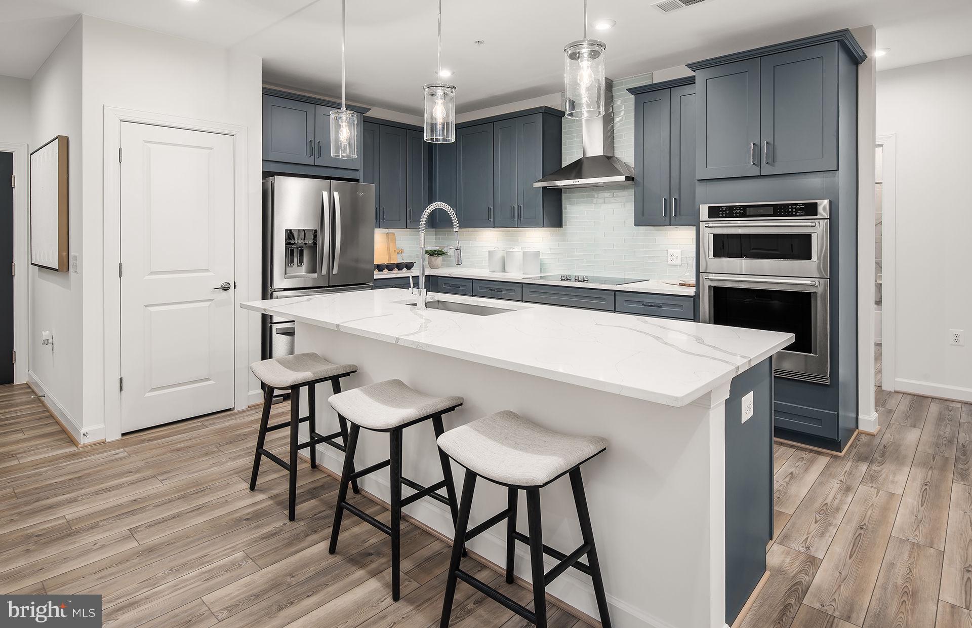 The grand Cole corner unit lives like a single family home. It's easy to downsize into a condo w/ 3 bedrooms, a dining room & a large gathering room.