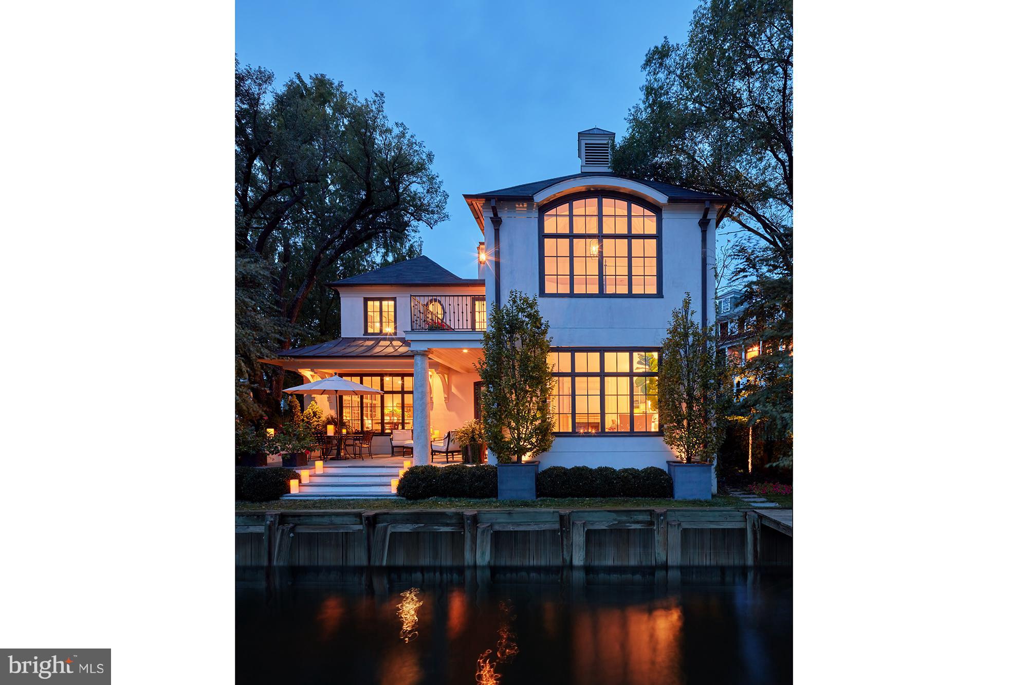 Wonderful home on Spa Creek located on secluded, private street.  Pvt. docks for 50 ft & 30 ft boat w/9 ft MLW.  Elegant details & materials crafted by 2 architect-owners. Dramatic water front LR, DR & cook's kitchen & 3 light-filled master suites. Intimate waterside patio & 2 parking spots.