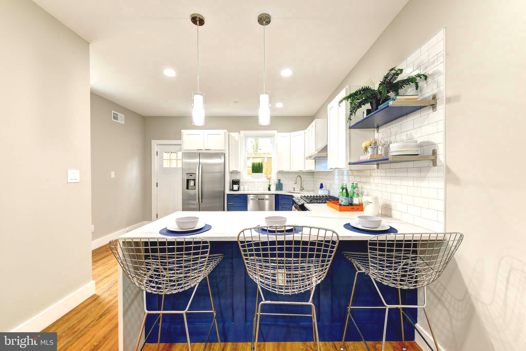 **NOW OFFERING 4.99% interest rate on qualified Buyers 1st year mortgage**
**Neighboring home just rented for $3,600/month — a fantastic opportunity for an investor to generate strong rental income!**
 Welcome to 135 E Springer St. A special and unique set of new construction twins in desirable Mt Airy location. This 4 BR/3.5 BA home was thoughtfully designed with classic architecture yet with modern floor plans and finishes ideal for today's lifestyle. The main level welcomes you with 10’ high ceilings, light-filled living room, central dining area, and true-chef’s eat in kitchen. The kitchen is fully equipped with stainless steel appliances, complemented by white shaker cabinetry and stylish blue lower cabinets, all crowned with a sleek quartz countertop. This floor is complete with convenient powder room. Access to 2 car off street parking on side driveway and rear patio perfect for grilling. The second floor features 2 guest bedrooms with juliette balconies, full bathroom with tub, and flex area with picture window perfect for office or library nook. Convenient Stacked washer dryer complete this level. Ascend to your primary suite oasis. Spacious bedroom with juliette balcony opens to a custom walk through closet, leading you to the spa-like bathroom featuring dual vanity, and frameless walk in shower. Floor is complete with bonus area with built in wet bar which is ideal for morning coffee or evening cocktails from your roof top deck. Complete with wine fridge, white shaker cabinets and quartz countertops. Enjoy your rooftop deck finished with trex decking and sweeping 360º and sunset views. Finished Lower level features 4th bedroom, full bath with walk in shower and additional flex space perfect for media room/recreation room/play room/home gym/ office.
Convenient location just blocks from Germantown commercial corridor, convenient to Chestnut Hill, Center City, transportation, major highways and Fairmount Park.. New construction is all around in this booming section of Mount Airy. FULL 10 year tax abatement, 1 year builder warranty.