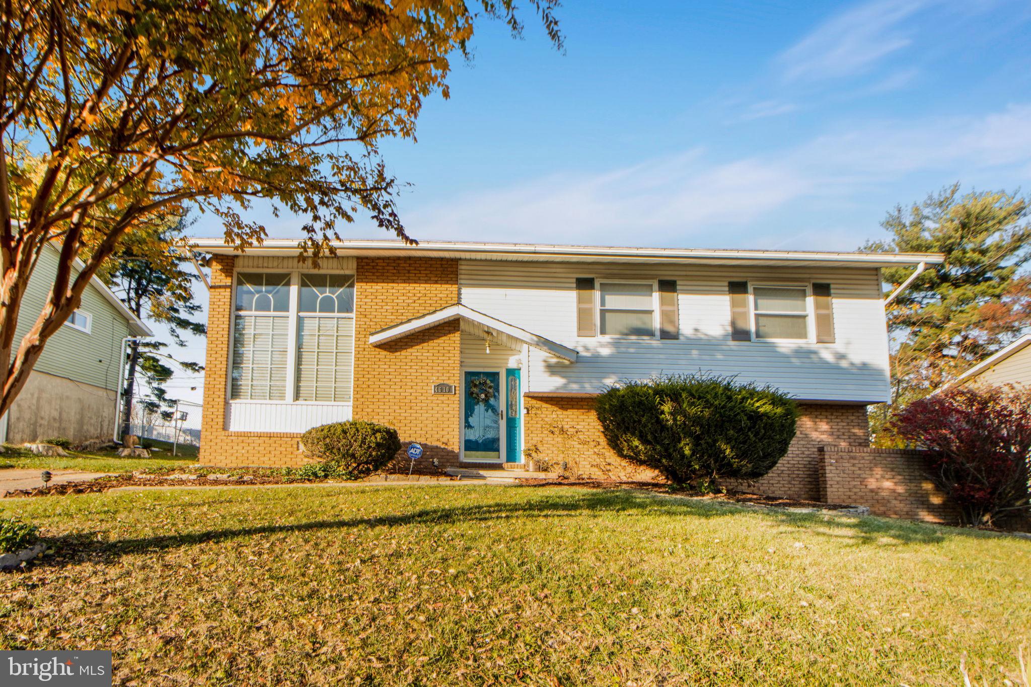 Charming split level home with 3 bedrooms and 2 1/2 bathrooms.  The main entry features a large family room with beautiful hardwood floors and lots of light.  The formal dining area is also light-filled from the sliding glass doors and the open lay-out beckons you into the newly renovated kitchen featuring a quartz countertop and matching stainless appliances with modern bronze handles.  The kitchen island has plenty of room for seating and there is also another breakfast nook off of the kitchen.  This living area offers lots of room for a family to spread out while still spending quality time together.  The lower level features an expansive recreation room with a fireplace along with a separate laundry room and half-bathroom.  The huge, fully fenced, backyard also has a deck with a pergola and a small shed.