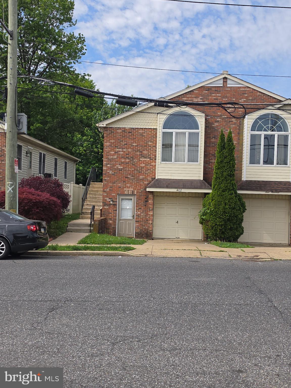 Welcome to this beautifully updated twin home in the heart of Fox Chase! Freshly painted throughout and featuring brand-new neutral carpeting, this move-in-ready home offers comfort, space, and convenience.

The bright and inviting living room is highlighted by a stunning arched window that fills the space with natural light. The spacious kitchen features a skylight, abundant cabinetry and counter space, a lazy Susan, gas cooking, dishwasher, and garbage disposal — perfect for everyday living and entertaining.

The main level also includes two generously sized bedrooms, including a primary bedroom with a walk-in closet, along with a full bathroom featuring a stall shower.

Downstairs, the expansive lower level offers endless possibilities for entertaining, relaxing, or creating additional living space. Complete with a cozy fireplace, second full bathroom with stall shower, laundry room, and direct access to the backyard, this level adds incredible flexibility to the home.

Additional highlights include an oversized garage with extra-high ceilings, interior access to the home, and exceptional storage throughout. Conveniently located near schools, shopping, and within walking distance to the train, this home combines suburban comfort with city accessibility.

Central A/C and washer and dryer.

Schedule your showing today!