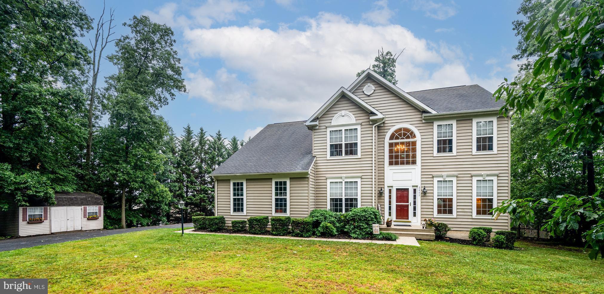 *Open House Saturday July 11th. 1:00-3:00
* Please remove shoes*
Welcome to 2805 Ridgeleigh Court in desirable Park Ridge Estates in Manchester, Maryland.

Nestled in a small, established community with no HOA, this beautiful Charles William model is being offered for the first time by its original owners. Situated on a private 0.56-acre lot, the home offers over 4,200 square feet of thoughtfully designed living space.

This home features four bedrooms, three and a half baths, and new carpet throughout. The kitchen includes all appliances, Corian countertops, a center island, and a gas range. It flows seamlessly into the spacious, step-down family room featuring a cozy gas- fireplace, creating the perfect space for everyday living and entertaining. Just beyond, the bright and airy sunroom is filled with natural light and provides easy access to the spacious deck overlooking the fully fenced backyard—ideal for relaxing or hosting family and friends.

The main level also includes a private den or office, along with elegant formal living and dining rooms accented by crown molding and chair rail.

Upstairs, the primary suite offers two large walk-in closets and a luxurious en-suite bath with a double vanity, a jetted soaking tub, and a separate walk-in shower.

The finished walkout lower level adds even more living space, complete with a bar, a full bathroom, and plenty of room for gatherings.

Additional highlights include a private driveway and an attached sideloading two-car garage, offering both convenience and excellent curb appeal.

This exceptional home offers space, comfort, privacy, and timeless appeal. Come see everything 2805 Ridgeleigh Court has to offer—we'd love to welcome you home!