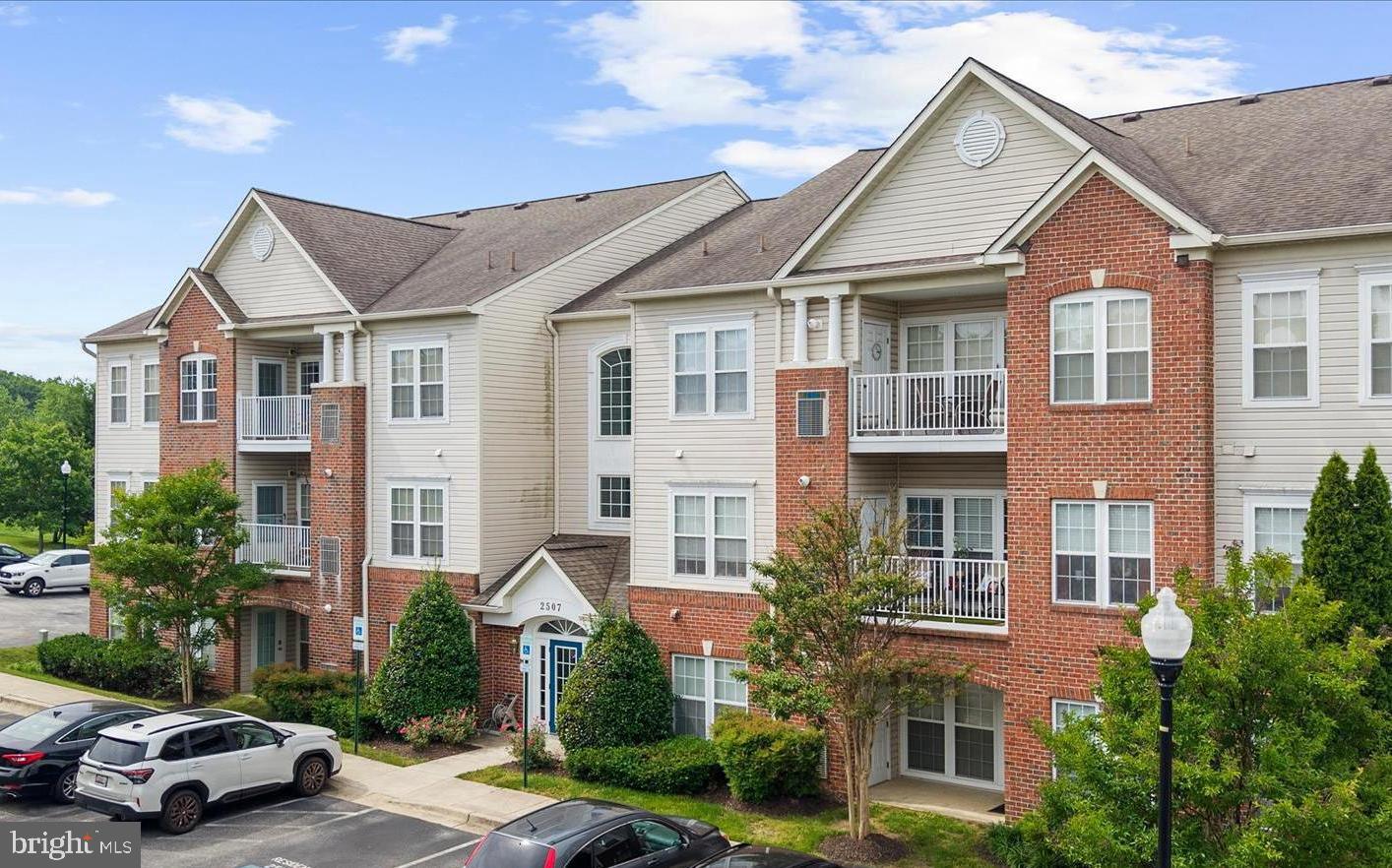 Come and enjoy all that Piney Orchard has to offer! This spacious unit is on the second level; accessed through a secured main entrance and ELEVATOR. The hallways to the home have been freshly painted and create a bright entry for the front door. Upon entering the freshly painted unit, you will find the foyer with storage closet and coat closet. To the right is a full bath, which adjoins to the 2nd bedroom. This bedroom is a great option for a second primary bedroom,  guest space, office, or gym! Moving further into the home, you will find the family room, kitchen, and separate sunlit dining area. The kitchen features a breakfast bar with a pass through, maple cabinetry, a pantry and laundry room.  The balcony is accessed through the dining/flex room,  a great space for a morning cup of coffee or just enjoying the day! The primary bedroom is spacious and features a ceiling fan and two closets; a walk-in and a mirrored sliding door closet. The primary also features an en-suite bathroom with a linen closet, stand up shower, double sinks and medicine cabinet.  In the association, you will find a fitness center, indoor pool and hot tub, community center outdoor pool, an island pool, the rotary pool, 4 tennis courts, pickleball courts, walking trails, biking trails, nature trails, and 5 tot lots/playgrounds throughout. Bonus farmer's market June-October. Minutes to Ft Meade, MARC train station, Rt 50, Rt 32, Rt 97, Rt 100 , and easy access to the Naval Academy and DC. The condo and all of its amenities make this the PERFECT place to live. Don't miss out on this great opportunity, come see it today!