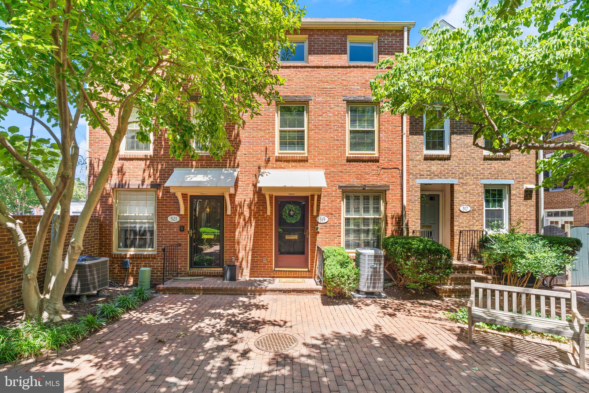 Welcome to 519 S Saint Asaph Street, a beautifully updated all-brick townhouse located in one of Old Town Alexandria's most coveted locations...the Southeast Quadrant's residential sweet spot.

Located within the quiet historic core, you'll enjoy tree-lined streets, charming brick sidewalks, and centuries of character, all while being just steps from the conveniences that make everyday life easy.

Start your mornings with a quick walk to Safeway just one block away, grab fresh produce at the nationally renowned Old Town Farmers' Market on Saturdays, or head to the waterfront for a run along the Mount Vernon Trail. Spend afternoons at Windmill Hill Park overlooking the Potomac River, let the kids enjoy nearby playgrounds, or meet friends for dinner along King Street's vibrant collection of restaurants, coffee shops, boutiques, and waterfront gathering spots. From your front door, the best of Old Town Alexandria is truly within footsteps.

Inside, this turnkey home offers over 1,500 square feet of thoughtfully designed living space across three finished levels. Newly refinished hardwood floors and fresh paint throughout (2026) create a bright, welcoming atmosphere from the moment you enter. The main level features an open and functional layout, anchored by a well-appointed kitchen with granite countertops, custom cabinetry, and seamless access to a private rear brick patio, perfect for outdoor dining, entertaining guests, or simply enjoying a quiet evening outdoors.

One of the home's most valuable features is its highly efficient four-bedroom floor plan, a rarity in this section of Old Town. The second level offers two spacious bedrooms with generous closet space and an updated full bathroom. The entire third floor serves as a private retreat, featuring two spacious rooms ideal for a nursery, guest room, home office, or flex space.

Beyond the cosmetic updates, you'll appreciate the peace of mind that comes with major infrastructure improvements, including a brand-new HVAC system installed in 2025.

Perhaps the greatest luxury of all is the private reserved parking space located in the private parking lot directly behind the home. Access the home through your rear gate or front courtyard; it provides a level of convenience rarely found in Old Town and eliminates the daily challenge of searching for street parking. Combined with low HOA fees of just $1,200 annually, the home offers an exceptionally low-maintenance lifestyle in one of Northern Virginia's most desirable neighborhoods.

For commuters, the location is minutes from the King Street Metro, or you can take the free King Street Trolley. Route 1 and the Beltway are all easily accessible, placing Amazon HQ2, National Landing, Reagan National Airport, Washington, D.C., Arlington, and Tysons within convenient reach.

Homes that offer this combination of location, walkability, functionality, and private parking rarely become available. Homes like this are not available often. This is a unique opportunity to enjoy the very best of historic Old Town Alexandria.