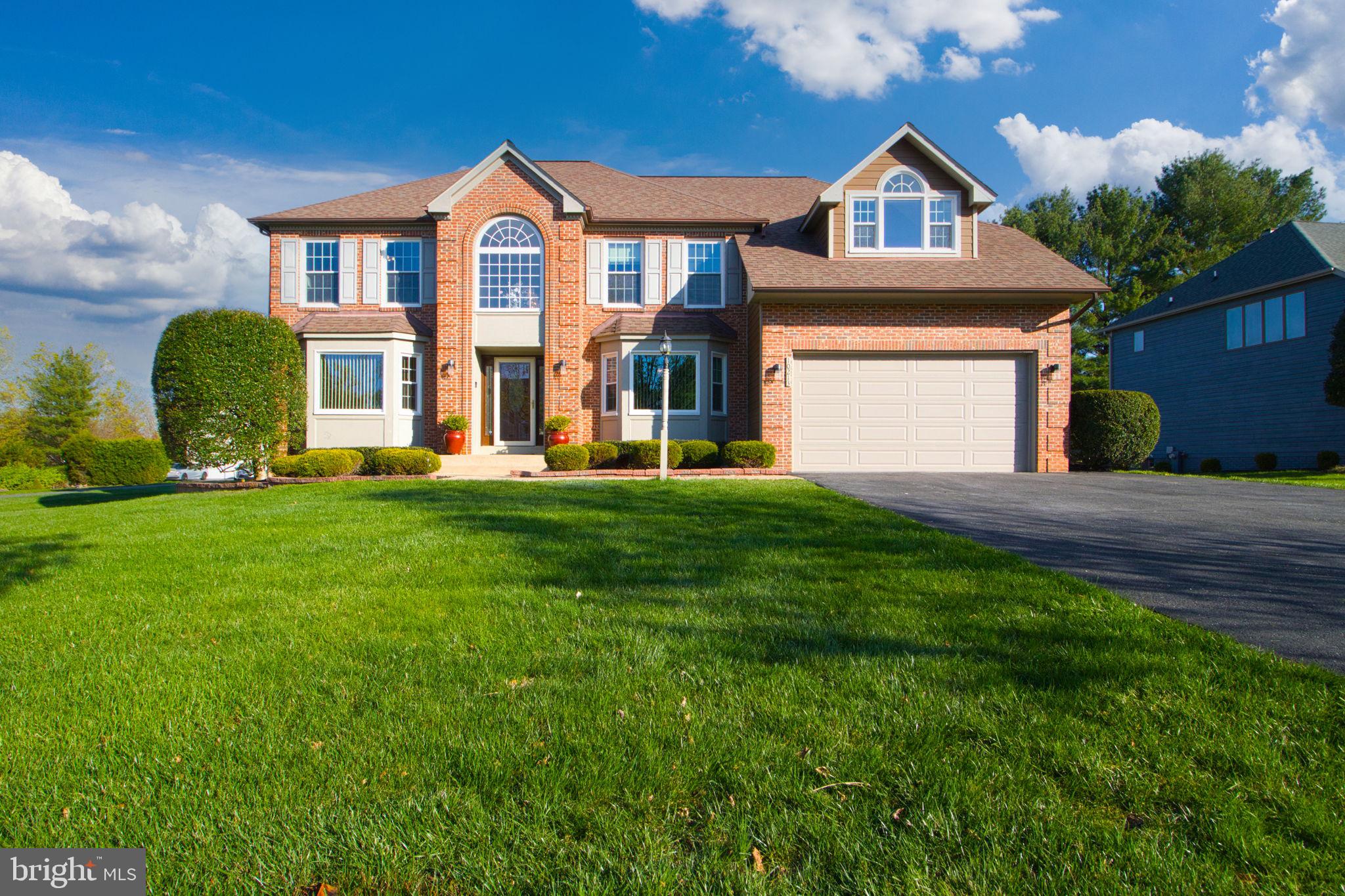 Seller has found home of choice! Welcome to this stunning Colonial home offering over 5,400 sq ft of luxurious living space! This beautiful property features 5 bedrooms and 4 full bathrooms, including a main floor bedroom and full bath, ideal for guests or multigenerational living. The open-concept  layout is perfect for entertaining, with a two story family room that boasts expansive windows, allowing for an abundance of natural light. Step through the sliding glass door to a beautiful deck that overlooks the lush yard, perfect for outdoor relaxation. The newly remodeled kitchen is a chef's dream, showcasing sleek quartz countertops and stainless steel appliances, while the two-sided wood burning fireplace can be enjoyed from the kitchen as well as the family room. Upstairs, you will find a luxurious primary suite  complete with a cozy sitting area, a large walk in closet, and a freshly updated en suite  featuring a soaking tub and walk in shower. Three additional bedrooms and an updated full bath complete the upper level. The fully finished lower level offers even more space to enjoy, with a large recreation room, bar, and game area, plus an exercise room, office/den, space full bathroom, and spacious storage room. An oversized attached two-car garage and a spacious driveway ensure ample parking. Conveniently located just minutes from restaurants, shopping, and major commuter routes, this home offers easy access to golf courses and parks, making it an ideal blend of comfort, and convenience. This home offers everything you need and more! Recent updates include New roof(2017), Hardy board siding(2017), Windows-50 year transferrable warranty(2011), kitchen appliances(2025), new carpet and freshly painted. Don't miss the chance to make it yours!