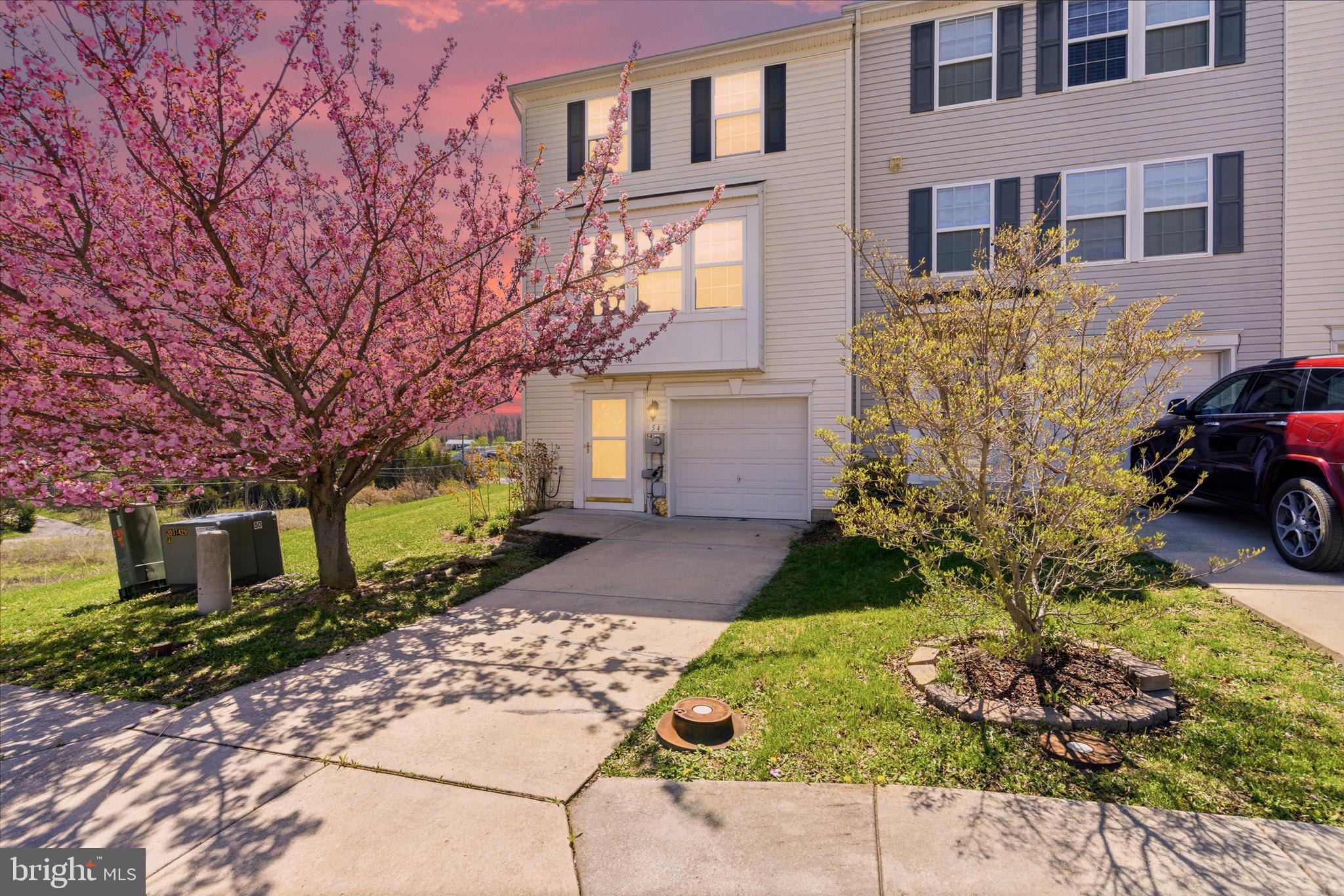 Welcome home to this well-maintained town home in Riverside Villages, where space and convenience come together effortlessly. Offering 3 bedrooms, 2 full baths, and 2 half baths, this home provides a comfortable and functional layout designed for everyday living and entertaining. New carpet has just been installed, and the finished lower level adds valuable flexible space—ideal for a rec room or home office. Out back, enjoy a large freshly painted deck with walk-down access, creating the perfect setting for outdoor gatherings or quiet evenings. Positioned at the end of a quiet court and backing to open field space, this home offers a level of privacy that’s hard to find. The attached garage adds convenience, additional parking area right out front while the location makes commuting a breeze with easy access to Maryland, I-81, and nearby shopping and amenities.  Schedule your showing today before it’s gone.