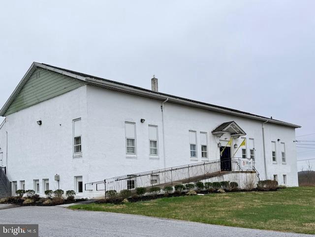 This property offers a unique investment opportunity with multiple income streams. The seller has obtained township approval to construct a 5,000 SF warehouse-style building, bringing the total to three potential income-producing structures. Currently, there is a 7,152 SF Building that was a school housethen the district court.  Full-size basement as well.  The second building is 3,520 and consists of 4 -Garages, with powder rooms and heaters. 

Since acquiring the property, the owner has made significant upgrades, including the installation of new heating systems and central air, a new septic system designed to support both the existing buildings and the proposed 5,000 SF warehouse, and a new buried propane tank. The upstairs of the main front building has also been fully remodeled. New Electric.  Powder rooms added to units in the rear garage. 

The property is currently 100% occupied, with manageable lease terms that provide flexibility for a potential owner-occupant. Existing tenants have expressed interest in remaining, though all tenancy arrangements will be subject to the new owner’s plans.

All buyers are responsible for independently verifying the details of the listing. If desired, the seller is open to discussing the construction of the approved 5,000 SF warehouse as part of the transaction.