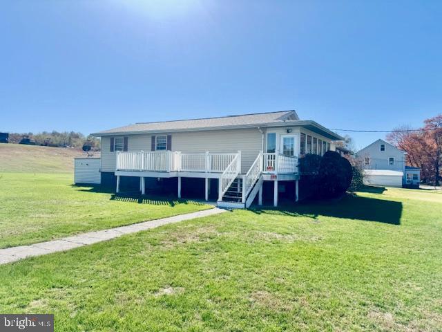 AS per 911. Address is now 66 Trenton Street. This inviting ranch home sits on 2 parcels of beautiful cleared land. Offering open  views , ease of maintenance and endless possibilities. Designed for comfortable one level living. This home provides a functional layout with bright, well proportioned rooms and convenient flow throughout. The surrounding cleared yard creates a sense of space for outdoor enjoyment, gardening, recreation. Ideal for those seeking single floor living with open outdoor space. This ranch home combines practicality, versatility, and the appeal of a setting ready to be enjoyed and customized. The attractive large glass enclosed porch that serves as a bright living space. surrounded by the expansive windows, the porch is filled with natural light and offers peaceful views of the outdoors while providing shelter from the elements. This enclosed porch seamlessly extends the homes living space. New flooring and freshly painted to enhance both style and comfort. The clean modern finish complements a variety of decor styles and adds overall appeal. This home offers a polished interior and a wonderful opportunity to enjoy updated living space. The full basement provides additional space and versatility. With generous square footage below the main level. Large side porch adding charm . Ample room for seating. Offering space suited for everyday enjoyment.