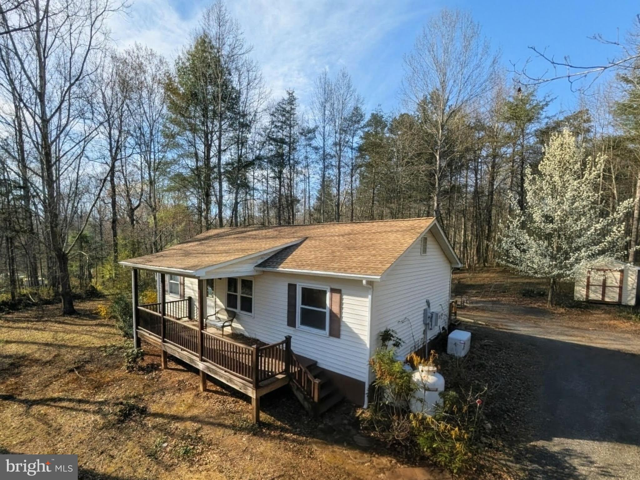 271 Rambling Rd | Ruckersville, VA | Wildwood Valley
Nature abounds. Offered for the first time since it was built in 1990, this well-cared-for home has everything you need and nothing you don't.
The comfortable single-level layout features 3 bedrooms and 2 full baths, with plenty of closet space throughout and a convenient laundry closet with washer and dryer included. Centered on over an acre of beautiful yard, relax on the covered front porch and take in the natural surroundings, or head to the back deck where a storage shed and raised garden beds await.
Wildwood Valley is a community with a picnic area, community lake for fishing and kayaking, and sweeping views of the rolling hills to the Blue Ridge Mountains. All of this just a short drive to Ruckersville and Charlottesville.
Added peace of mind comes with a whole-home backup generator and fully encapsulated crawlspace. New Roof and Gutters August 2022.