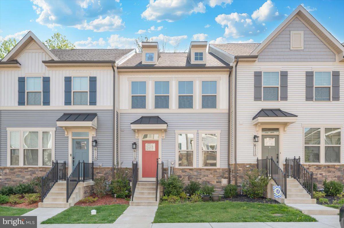 New reduced price — a great opportunity to own this well-maintained residential townhome. Discover upscale living in this impeccably maintained four-level Luxury 'NV Homes' townhome, ideally situated in the highly desirable Lake Linganore community. This residence offers an exceptional blend of elegant design, generous space, and everyday comfort. The main level features a bright open-concept layout with 9-foot ceilings, a spacious living area, dining space, and a gourmet kitchen complete with a large island, stainless steel appliances, double ovens, and premium finishes. Step out onto the expansive covered balcony—perfect for entertaining or relaxing. A convenient half bath completes this level. The home also enjoys a private wooded rear view, offering added tranquility. Upstairs, the luxurious primary suite features a walk-in closet, dual vanities, and a stylish stand-up shower. Two additional bedrooms and a full bath provide ample space for family or guests. A spacious laundry room with washer and dryer included adds everyday convenience. The fourth level offers a spacious suite with a full bath, large closet, and comfortable sitting area—ideal as a private retreat or versatile living space. The fully finished 850 sq. ft. walk-out lower level includes a private bedroom with a full bath, making it perfect for guests, a home office, or a fitness space. It also features a home theater with upgraded in-wall speakers for an immersive entertainment experience. Double patio doors open to a wooded view, providing added privacy and natural light, along with additional space ideal for a bar or entertaining area. Conveniently located just minutes from I-70 and I-270, the home offers easy access to Baltimore, Washington, DC, the MARC train, and nearby shopping and dining. Residents enjoy exceptional community amenities, including four swimming pools, two private beaches with lake access, over 35 miles of scenic hiking and biking trails, basketball, tennis, and volleyball courts, community centers, sidewalks, and multiple playgrounds—including one on the same street. The community also features weekly food trucks, farmers markets, concerts, and year-round events.  The award-winning Oakdale Schools are ideally located nearby, providing access to top-tier educational opportunities. Don’t miss this rare opportunity to own a beautifully appointed home in one of the area’s most sought-after communities.