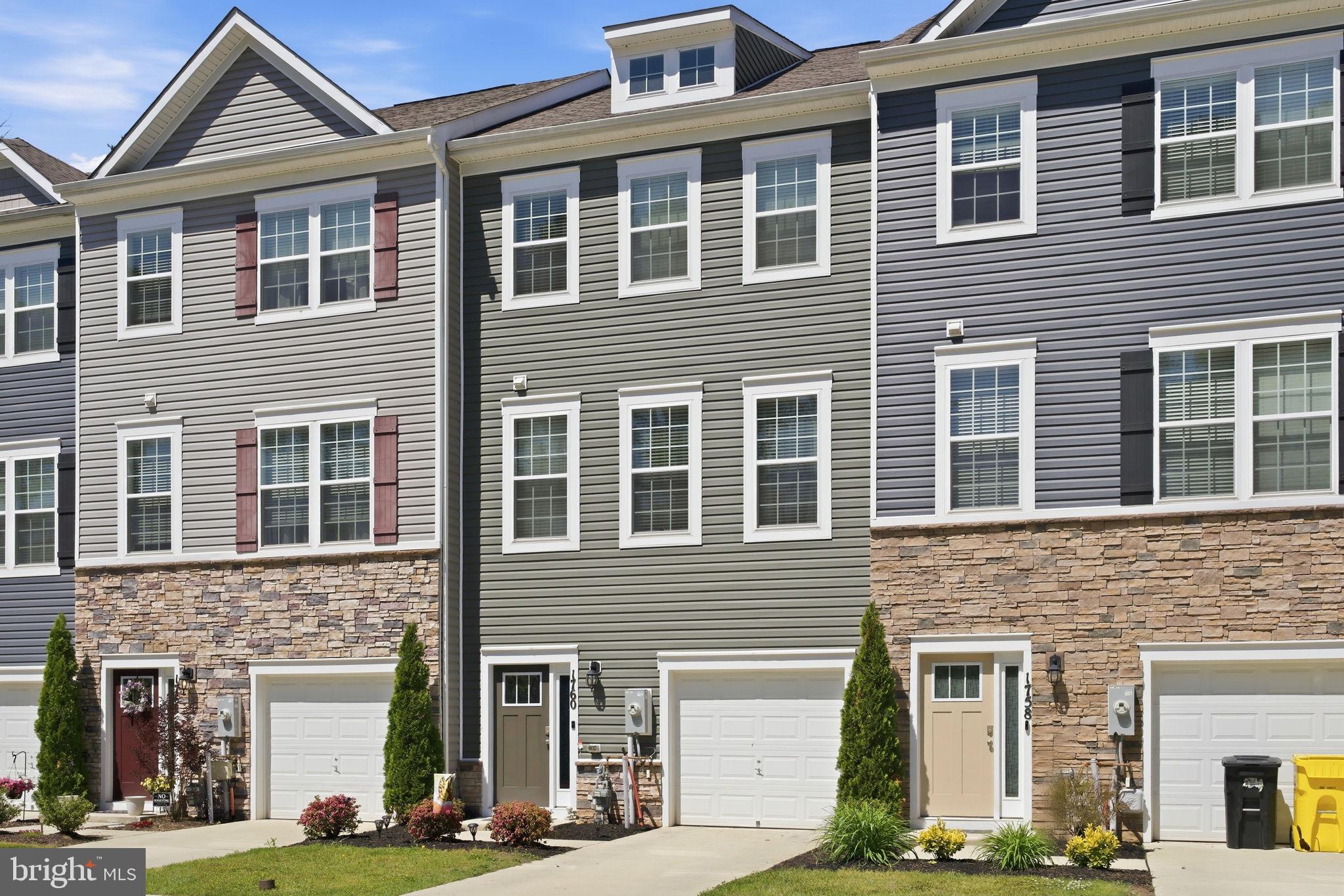 PRICE IMPROVEMENT - Beautiful like-new townhouse in the heart of Odenton Town Center. This home features a one-car garage and a bright, open entry level with tall ceilings and a spacious rec room that makes the perfect space for relaxing and gathering. 

The main level offers an open-concept layout with LVP flooring throughout. The kitchen is anchored by an impressive 12-foot island and features granite countertops, stainless steel appliances, and a gas cooktop. The living room is bright and inviting and walks out to a deck that is perfect for outdoor entertaining.

Upstairs you will find three bedrooms, including a spacious owner’s suite with a walk-in closet and en suite bath. Top floor laundry adds convenience.

Conveniently located just moments from the MARC station and Route 32, this home offers a quick drive to Fort Meade and an easy commute to Washington, DC. Enjoy nearby dining and entertainment options including Ruth’s Chris, The Hideaway, Lime & Salt, and more.