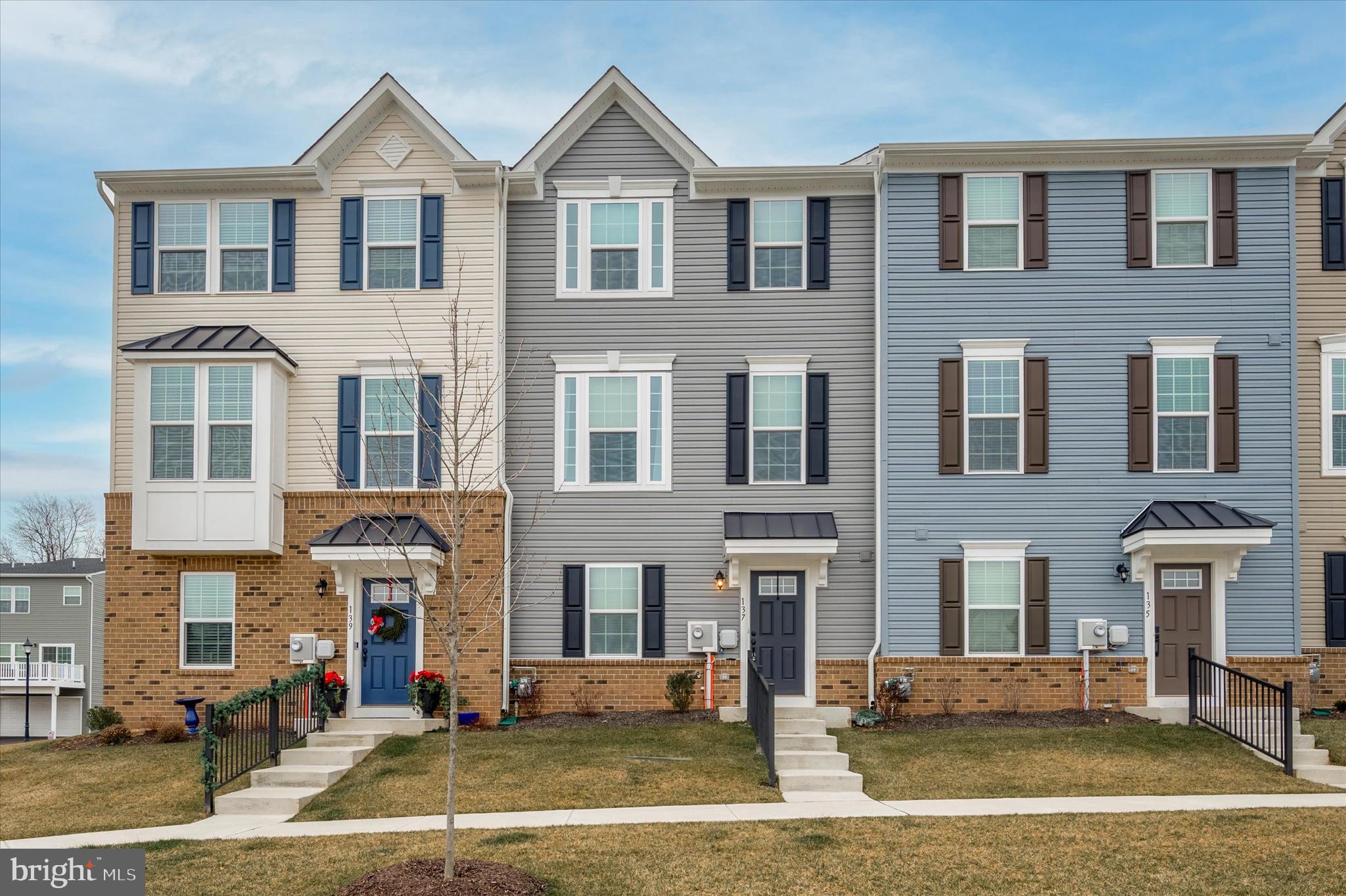 Welcome to 137 Bishops Way, a luxurious new construction townhome in the heart of Dublin Boro's desirable Dublin Crossing. Recently crafted by Ryan Homes in 2022, this property is less than a year old and perfectly blends modern elegance with the comfort of suburban living.

As you enter this exquisite three-story home, you will find a private den with French doors that could be used as a home office or workout room along with a powder room and mud room. The house features 3 well-appointed bedrooms and 2.5 stylish bathrooms, each space crafted with comfort and contemporary style in mind. This home is designed for both grand entertaining and intimate family evenings.

The main bedroom suite is a personal haven, complete with a sophisticated tray ceiling, a spacious walk-in closet, and a private bathroom boasting a dual vanity and luxurious dual shower heads. The additional bedrooms offer generous space and natural light, creating a warm and inviting atmosphere.

At the heart of this home is the state-of-the-art kitchen, outfitted with modern appliances and stainless steal appliances, quartz counter tops and a large center island. The kitchen seamlessly flows into the family room, creating an open, airy space ideal for hosting and making memories.

Step outside to the deck, accessible from the kitchen, and enjoy the enchanting Pennsylvania sunsets, or simply savor a peaceful outdoor moment. This outdoor area is a perfect extension of the home for relaxation and entertainment.

Nestled in a bustling locale, 137 Bishops Way puts you steps away from shopping, dining, and other local amenities. Its proximity to major routes like 611, 202, and 309 means you are never far from the conveniences and attractions of Montgomeryville, Doylestown, Lehigh Valley, and beyond.

Embrace the lifestyle that 137 Bishops Way offers – a blend of tranquility, convenience, and modern sophistication. This isn't just a place to live; it's your new chapter in a home where every detail caters to upscale, comfortable living.