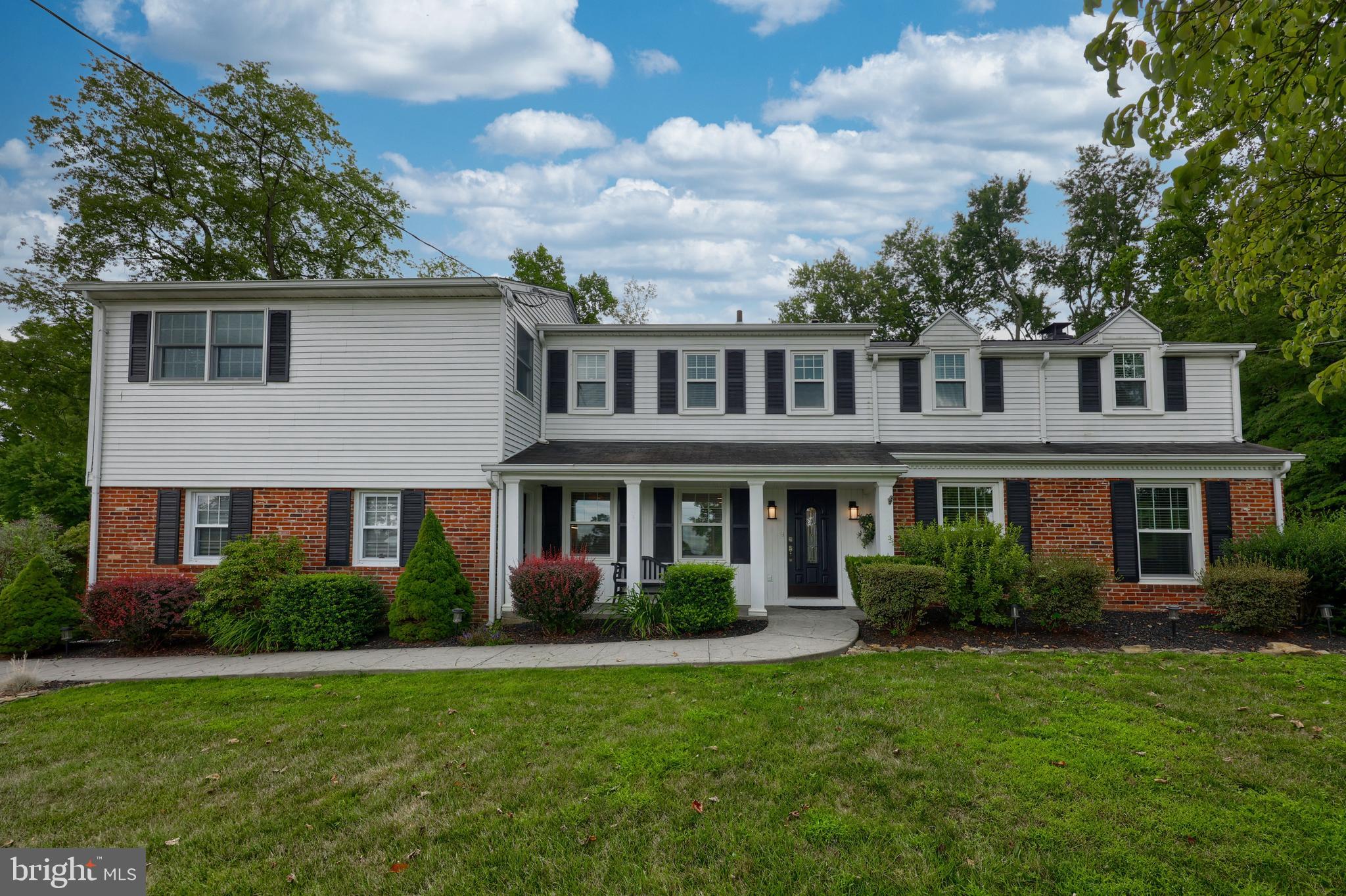 Dreaming of living in the prestigious Lower Merion School District in the town of Villanova, Pennsylvania?  This stunning property offers a perfect blend of classic charm and modern amenities. Built in 1962, this single-family home has timeless elegance and has been meticulously updated and maintained with ample space, ready for you to move in and start enjoying.  Walking distance to the new Blackrock Middle School, Villanova University, and Stoneleigh Natural Lands Park. Upon entering the foyer, you’ll find a large updated gourmet kitchen on your left, complete with stainless steel appliances, dark cherry cabinetry, double ovens, and tile floors.  A large island provides the perfect spot for entertaining, and the kitchen conveniently connects to the first floor laundry room. To the right of the foyer is the spacious living room, bathed in natural light from newer windows with views of the lush green lawn and seasonal foliage. Towards the rear of the first floor is a half bath and a formal dining room with a newer flush mounted Napolean woodstove, a second half kitchen or bar, and an additional full bath with a large accessible shower. The finished basement offers ample storage and additional rooms that can serve as a gym, office, or playroom.  On the second floor, the large master bedroom awaits with its own en-suite full bath and private balcony for morning coffee or evening cocktails.  An adjoining room provides an ideal home office or 5th bedroom.  This floor also includes a full hall bathroom, two nicely sized bedrooms and a large third bedroom with en-suite bathroom.  Nestled on a generous corner lot size of 0.7 acres, the property provides plenty of outdoor space for relaxation and recreation. The beautifully landscaped yard is highlighted by a stunning custom in ground heated pool and spa with new coping and tile, surrounded by lush, meticulously maintained landscape.  Whether you’re hosting a summer cookout, enjoying a quiet evening by the fire pit,  or simply lounging by the pool, it’s a perfect private retreat for family and friends. The home's spacious bedrooms offer a peaceful retreat, with ample natural light and storage space. The bathrooms are elegantly designed, with luxurious fixtures and finishes that add a touch of sophistication to the space. Located in a sought-after neighborhood, this property offers the perfect combination of privacy and convenience. With easy access to local amenities, shopping, dining, and top-rated schools, this home provides an ideal setting for a modern lifestyle. Overall, 301 Saybrook Rd in Villanova, PA is a truly exceptional property that offers a rare opportunity to own a piece of timeless elegance in a desirable location. With its classic architecture, modern amenities, and spacious living areas, this home is sure to impress even the most discerning buyers.