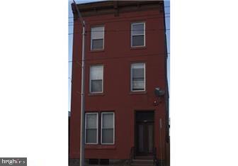 2 unit brick building with private parking. Very spacious rooms. This is a must see! Call for your private showing today!