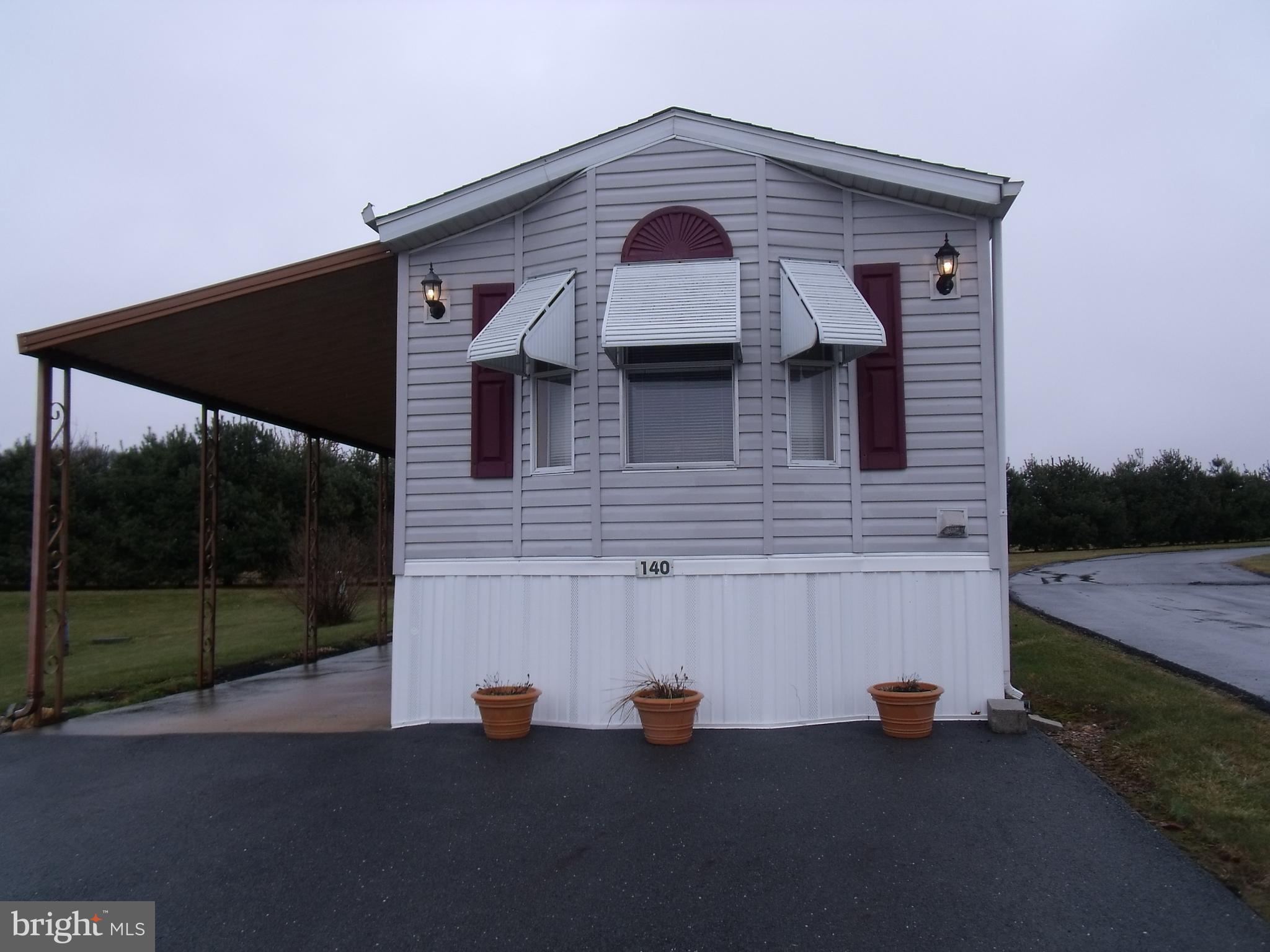 Great home on corner lot. 2 BR 1.5 BA. Large open kitchen, living room & sitting area. Covered patio/deck/car-port area & shed.