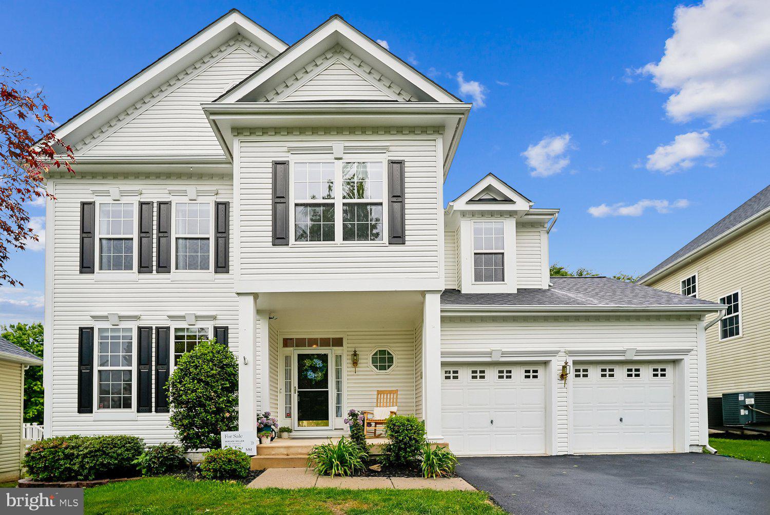Welcome to this beautifully maintained three-level home in Round Hill, where soaring ceilings, natural light, and thoughtful updates come together to create a space that simply feels good from the moment you walk in. Hardwood floors lead you through the main level where the layout flows effortlessly. The formal living and dining spaces are bright and inviting, with a charming bay window adding warmth and character, creating the perfect backdrop for holiday dinners, celebrations, or gathering with friends. The heart of the home is the updated kitchen featuring stainless steel appliances, beautiful countertops, a tile backsplash, and a center island with plenty of prep and storage space. Just beyond, the breakfast area opens into a dramatic two-story family room where oversized windows flood the space with natural light. Add in a cozy gas fireplace and you've got the kind of room where movie nights, coffee mornings, and lazy Sundays naturally happen. Upstairs, the spacious primary suite offers vaulted ceilings, a walk-in closet, and a private bath with dual vanities, a soaking tub, and separate shower, giving you a quiet place to recharge at the end of the day. Three additional bedrooms feature fresh carpeting and generous closet space, plus the convenience of an upper-level laundry room because carrying baskets up and down stairs belongs in another decade. The finished lower level gives you flexibility for however life unfolds. Create a recreation space, home office, workout area, hobby room, or all of the above. Sometimes the best rooms are the ones that become whatever you need them to be. Outside, the fenced backyard and Trex deck create an extension of your living space. Summer barbecues, backyard games, gardening projects, or relaxing under the evening sky all fit naturally here. Major updates including a newer roof, sealed driveway, and newer deck provide peace of mind and help make this home feel truly move-in ready. Located in the heart of Round Hill, you're just minutes from shopping, wineries, breweries, parks, and local favorites while still enjoying the small-town charm that makes Loudoun County so special. With over 3,100 square feet of living space, thoughtful updates throughout, and a location that offers both convenience and community, this home checks all the boxes and then quietly adds a few extras.