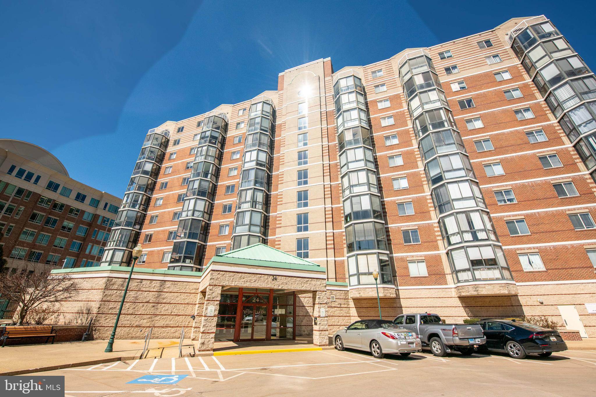 Sun-Drenched Luxury: Move-In Ready, 1-Bedroom Condo in Vibrant Downtown Rockville!

Welcome to your sophisticated, move-in-ready urban oasis in the heart of The Victoria Condominium, where modern elegance meets supreme convenience. This beautifully renovated and expanded one-bedroom condo is drenched in natural light.

The thoughtful, efficient layout (approximately 724 sq. ft.) features new custom painting, sleek hardwood flooring, and upgraded lighting. The expanded living space flows seamlessly through a sliding glass door into your private, enclosed sunroom, a tranquil retreat overlooking a quiet courtyard. At the heart of the home is a luxurious gourmet kitchen. It boasts custom maple cabinetry, rich granite countertops with a stainless steel undermount sink, a pull-out faucet, and a breakfast bar, all complemented by 12-inch DuraCeramic tile flooring.

The generous master suite includes a walk-in closet and linen closet, and the adjoining master bathroom is elegantly upgraded with designer ceramic tile, an oversized maple vanity with granite, and a full tub with a ceramic tile surround. For ultimate convenience, a stackable washer and dryer are included in the master bath closet.

Enjoy a worry-free, pet-friendly lifestyle with resort-like building amenities, including a fitness room, outdoor courtyards, and professional on-site management. Your condo fee covers the cost of gas heating for hot water, water consumption, and HVAC maintenance and replacement, ensuring worry-free living. Highly sought-after features include a deeded Underground Garage Space (#162) and a nearby Private Storage Area (#62).

The location is truly prime. Step outside to the vibrant Rockville Town Center, the County seat, featuring fine restaurants, sidewalk cafes, shopping, the Regional Library, Regal Cinemas, and year-round cultural activities like festivals, concerts, and an ice rink.

Don't miss this one-of-a-kind opportunity for sophisticated downtown living. It's a very special location. Call today to schedule your private tour!
