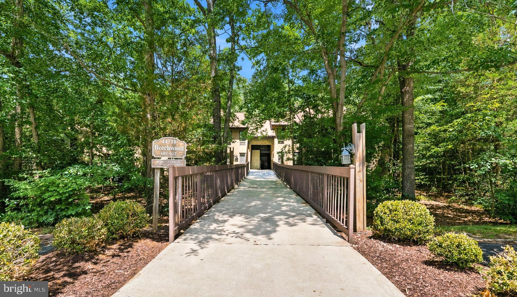 This updated 2-bedroom, 1.5-bath condo offers easy, low-maintenance living in one of the area's most desirable communities. Inside, you'll find LVP flooring throughout and updated appliances making this home truly move-in ready. The ground-level location is a standout feature, allowing you to step right out your sliding glass door onto your private patio and enjoy easy access to the common grounds. Conveniently located near shopping, dining, schools, and NAS Patuxent River, this is a great opportunity to enjoy all that Wildewood has to offer.