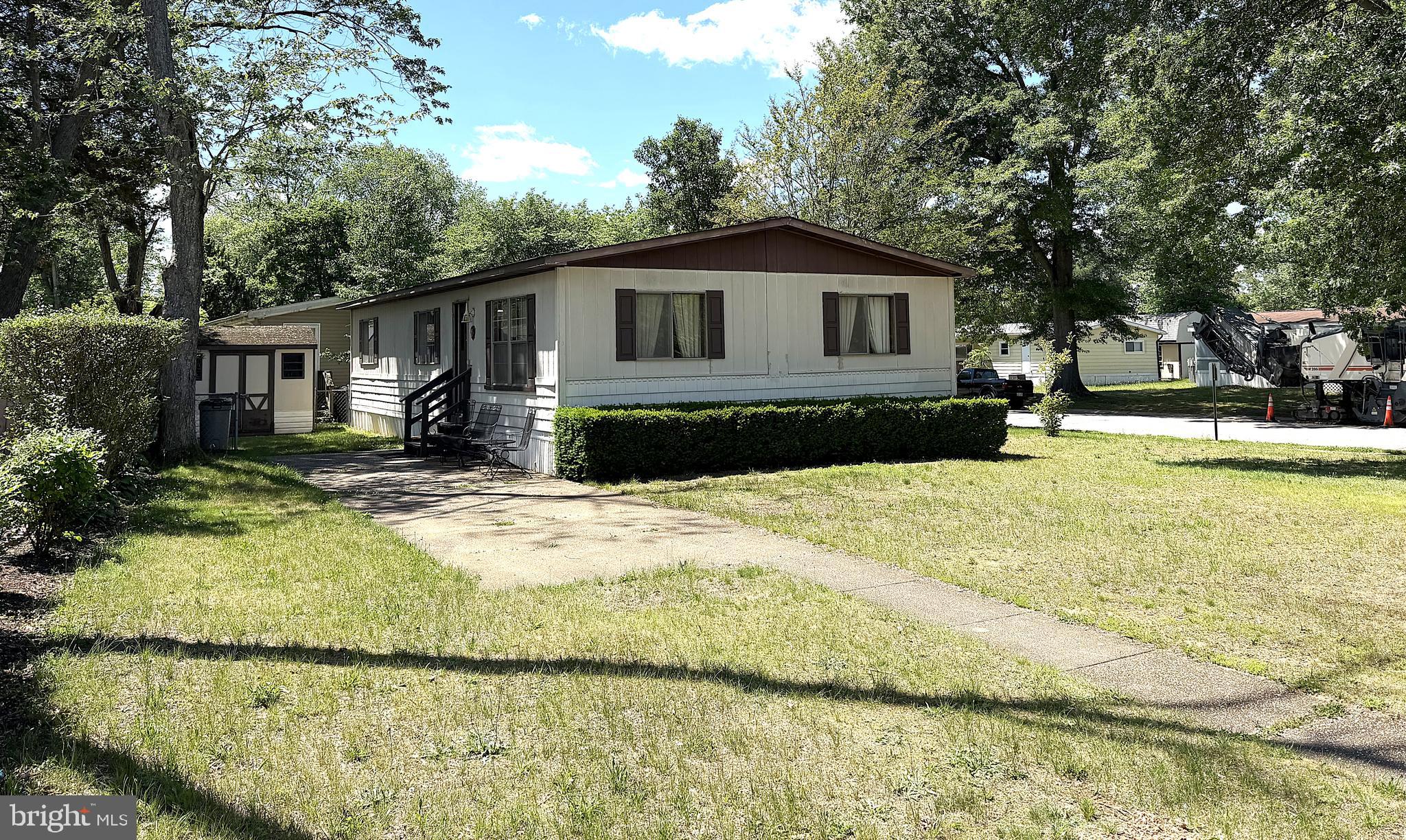 Nicely Kept Double Wide on Big Corner Lot in Sought After Maryland Manor! Over 1600 square feet of Living Space with 3 Bedrooms, 1 Full and a Half Bath. Open Floor Plan with a Large Living Room, Kitchen with a Breakfast Bar and Formal Dining Room. Outside you have a huge yard with a Big Patio and Secure Storage Shed. The Community features a Large Playground for your children to enjoy. Close to Schools, Parks and the Patuxent River. 20 Minutes to Andrews AFB and the Capital Beltway. 3o Minutes to Annapolis. Don't mis the Opportunity to own a 3-Bedroom Home at a Very Affordable Price!