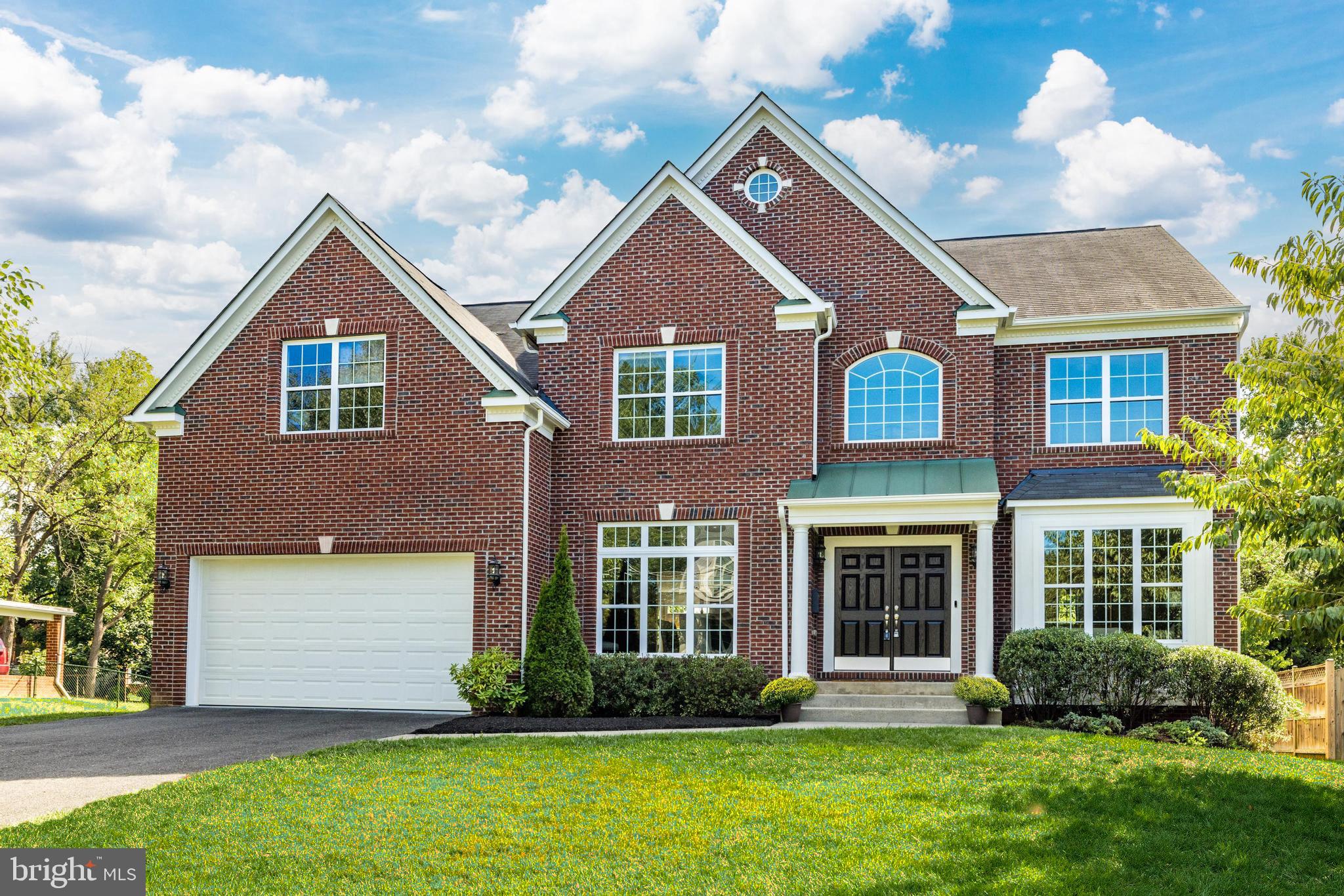 This stately refreshed and updated 6 bedroom, 5 bathroom brick colonial on .29 acres in Chesterbrook Gardens offers an exceptional living experience. Pristine landscaping and front walk leads to a grand foyer that welcomes you with an inviting two-story staircase and is flanked by a formal living room and a formal dining room w/ tray ceiling and designer lighting. The library can also be used as a main level bedroom with the adjacent full bath. The main living areas boast hardwood floors, two-story windows, classic trim, new light fixtures and paint, all highlighted by the abundant natural light throughout.

The eat-in kitchen features a center island, granite countertops, a butler’s pantry and breakfast room with lovely views of the expansive and flat rear yard. There’s a large walk-in pantry and separate mudroom adjacent to the kitchen as well. The kitchen is also open to the two-story great room with fireplace and again, abundant natural light. Main-level library and full bath round out a very practical floorplan on the first floor.

All bedrooms on the upper level have new carpeting. The primary bedroom epitomizes comfort and elegance, with a tray ceiling, sitting room and generous walk-in closets. The ensuite bathroom is amply sized with dual vanities, and an oversized luxurious shower and spa soaking bath. Across an open breezeway, you will find three well appointed bedrooms, with two more bathrooms.

The expansive, daylight/walk-out lower level recreation room has a rough in for a wet bar and contains loads of potential for future customization. The lower level also features a large unfinished storage room, a media room with a tiered floor, a guest bedroom and a full bathroom. 

Nestled near on a quiet street in the heart of McLean in Chesterbrook Gardens, this home offers the perfect blend of tranquility and convenience. With quick access to major commuter routes including Metro and 495, and situated in the coveted McLean High School pyramid, this is the epitome of luxurious suburban living.