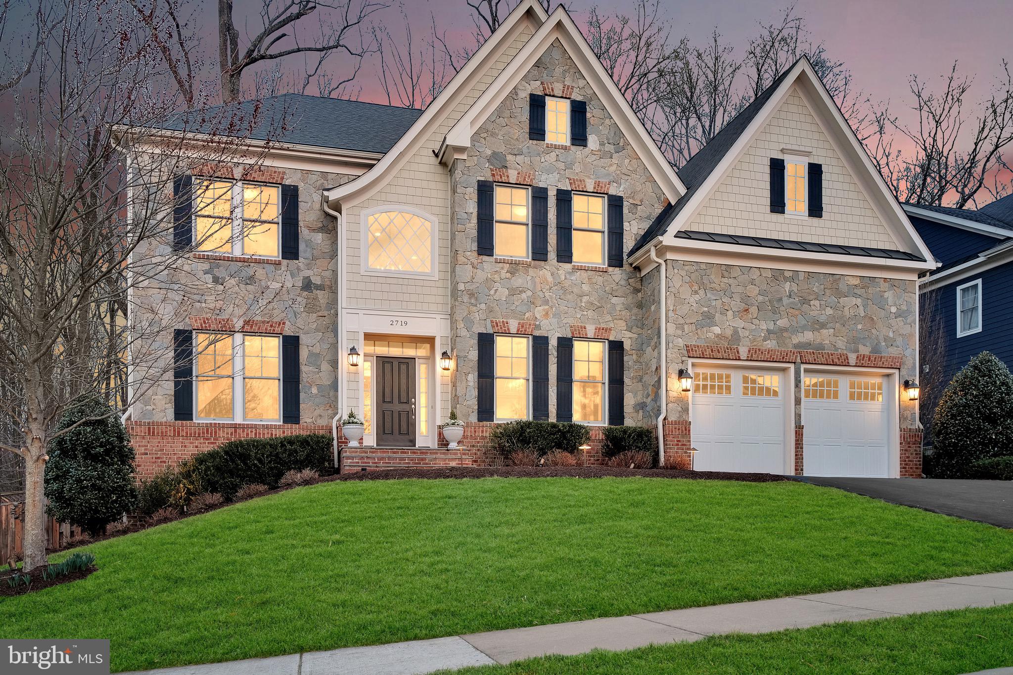 Welcome to one of the most exceptional residences to hit the market near the heart of Vienna this year. Nestled on a serene cul-de-sac of similar residences and backing to the lush expanse of Nottoway Park with an enormous common space that offers an extension of the backyard, this John Sekas-built masterpiece offers an unrivaled blend of privacy, sophistication, and meticulous craftsmanship. From the moment you arrive, the home’s impressive curb appeal is unmistakable, sitting above the street with the breathtaking rear privacy evident even from the front.

Every detail inside has been thoughtfully updated to meet the highest standards of luxury living. Sun-drenched windows, elegant millwork, and refined finishes flow effortlessly through the spacious floor plan. Featuring over 6,600 finished square feet, 6 bedrooms, and 7 bathrooms, this residence will cater to every family’s needs. From the moment you walk in the door, you’ll be overwhelmed by superior craftsmanship and an abundance of natural light at every turn. The entire home features crown molding on every level, solidifying a level of detail rarely found in residences.

The main level features soaring ceilings, gorgeous oak floors, 10’ ceilings, and generous windows that soak every corner with natural light. Adorning the main level is the piano room, dining room, office that can be used as a bedroom, expansive family room with a cathedral, chef’s kitchen, expansive pantry, and a mud room. The chef’s kitchen features high-end KitchenAid appliances including a 6-burner commercial cooktop and 42” built-in refrigerator, custom hardwood cabinetry, a sprawling island with seating, and a pantry large enough for the biggest families.

Upstairs you will discover 4 bedrooms, all with en-suite bathrooms, a full laundry room, and an incredible amount of storage. The primary suite includes a sitting room, two walls of windows overlooking Nottoway Park, two expansive walk-in closets, and a dreamy primary bathroom with two vanities, a stone freestanding soaking tub, and a glass-enclosed shower. Each secondary bedroom not only includes its own en-suite bathroom, but it also includes ample closet space. In the laundry room, you will find a pull-down attic for additional storage.

On the lower level, you’re met with an open-concept recreation area, completed an open living room. The recreation area has plumbing for a wet bar to be easily added. Two sizeable bedrooms are found in the lower level of the home, each with an en-suite bathroom and large walk-in closet. Finishing off the lower level is your own fitness studio. The lower level features all above-grade windows, custom plantation shutters, crown molding, and a walk-out to your impeccable backyard.

Enhanced by a six-figure, professionally designed landscape that transforms the backyard into a botanical paradise, this might be your favorite part of the residence. Throughout the summer, vibrant hydrangeas create an enchanting display, complementing the home’s stately architecture. Featuring a sunken fire pit with embedded gas line, Trex decking, walking paths with hydrangeas, privacy fencing, and a built-in hot tub – all overlooking the serenity of parkland. The yard is enhanced by a large lot directly next to the home where nothing can be built, perfect for practicing sports or playing fetch with the dog. At twilight and in the evening, enjoy beautiful landscaping lighting highlighting the magnificence of the backyard.

This residence is just over the Town of Vienna line, meaning it's free from the Town of Vienna tax burden. Receive all the benefits of being close to town, without the added cost. In the heart of all Vienna has to offer, while still close to the Vienna Metro, Oakton, and commuter routes. Enjoy the vibrancy of Vienna with its charming boutique shops, gourmet restaurants, and year-round community events. The features of this home are too extensive to list here – contact Listing Agent for info.