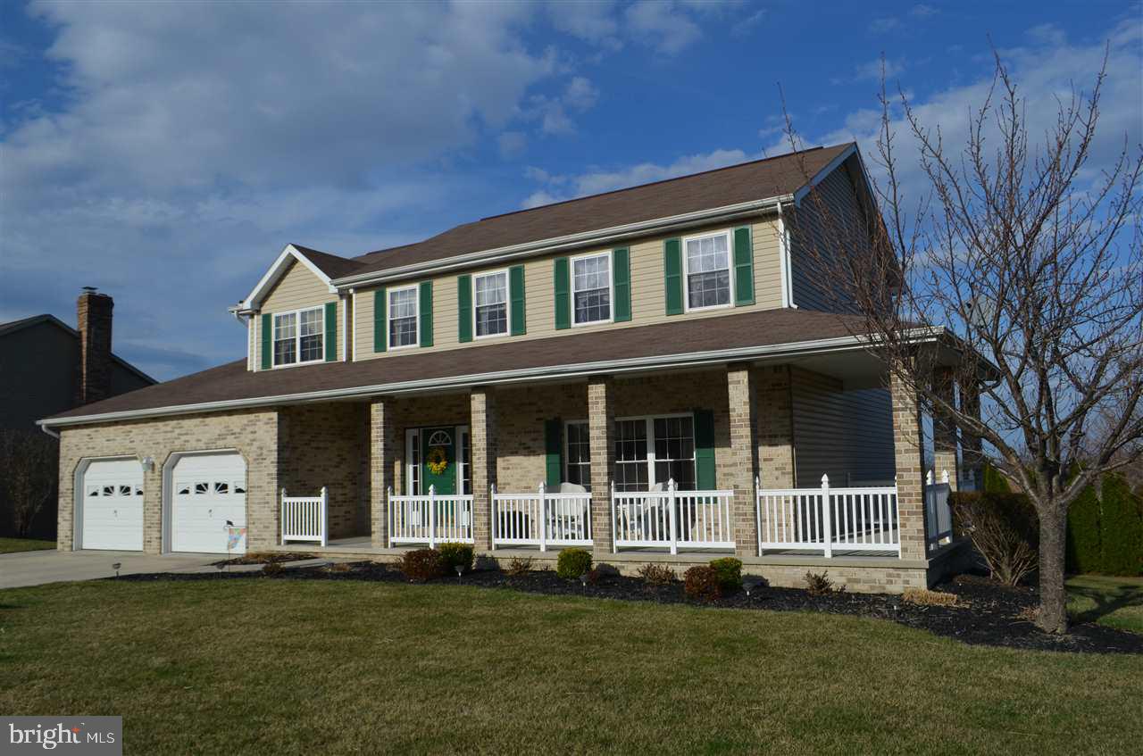 Fabulous home featuring 4 Bedrooms, 2.5 bath. Family room w/gas fireplace. Kitchen double ovens, center island & pantry, dining rm has hardwood floors. Large master Bedroom w/walk-in closet, 2nd floor laundry, w/o LL awaiting your finishing. Home has a 12x18 covered deck and a 2 car oversized garage. Refrigerator, washer & dryer are negotiable. Large yard with lots of privacy trees. View today! Go Steelers