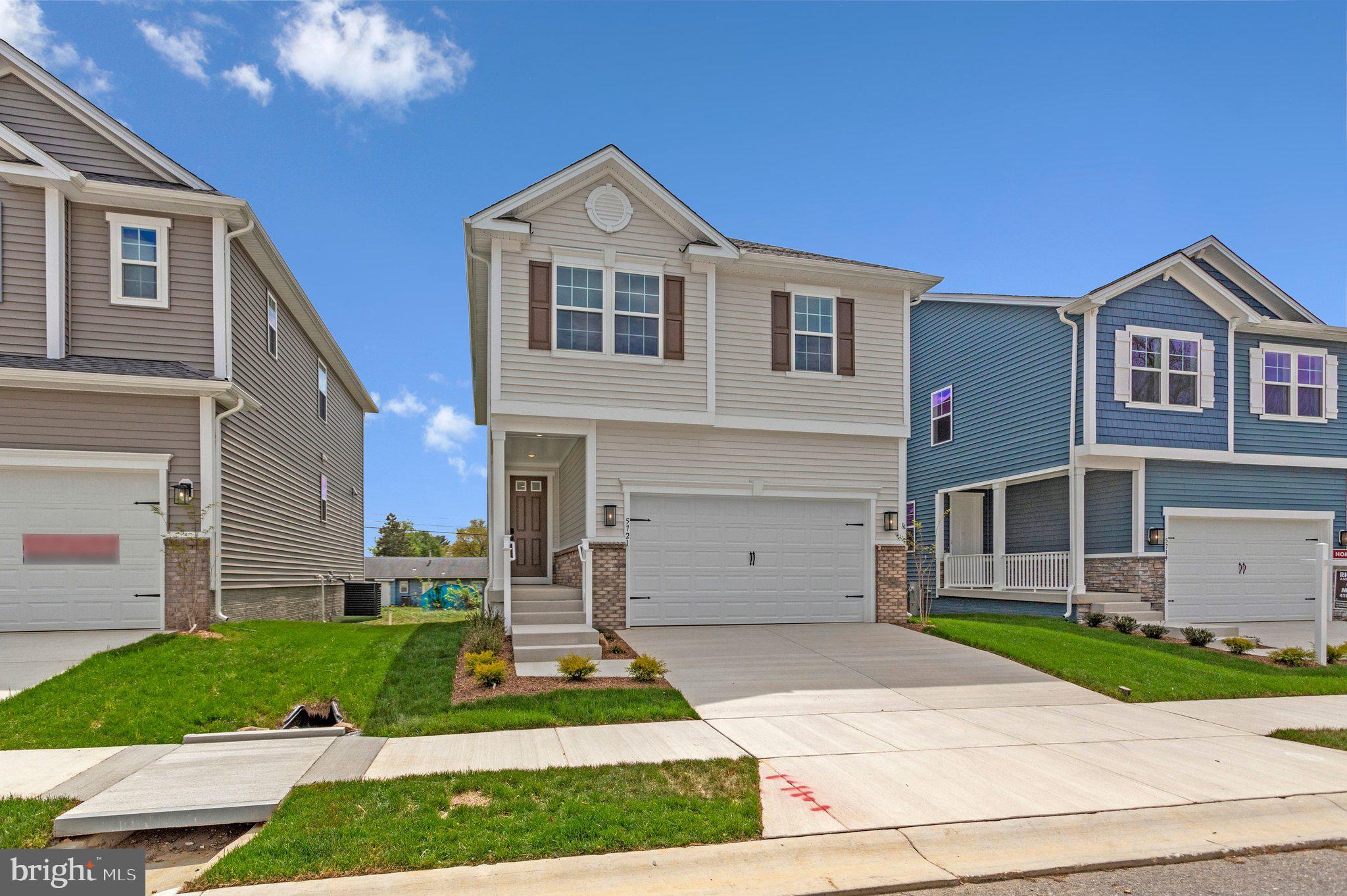 RATES UNDER 5%! YOU CAN BUY THIS BRAND-NEW HOME READY FOR IMMEDIATE OCCUPANCY FOR THE SAME P&I PAYMENT AS A $570,000 RESALE! This brand-new 4-bedroom, 3 1/2 bath Lynette by Richmond American Homes. The main floor of this charming Lynette plan offers an inviting great room with an electric fireplace, mantel, stunning floor to ceiling tile, Mohawk luxury vinyl plank on the main level, 9' ceilings with 8' doors, a powder room, & a gourmet kitchen with a convenient island, quartz countertops throughout, backsplash, pantry with wood shelves, beautiful Oak Stairs take you to the top floor, you’ll find four elegant bedrooms, including a primary suite showcasing a roomy walk-in closet and a deluxe bath with double sinks. A secondary bath, top floor laundry room, 2-garage with electric vehicle charging station, video doorbell, smart locks, smart thermostat for energy efficiency, & last but not least a finished basement with 9' ceilings, rough-in for wet bar with a full bathroom complete this home. Enclave at Arundel Hills is an exciting new community in Glen Burnie. It offers easy access to major employers in Baltimore, Annapolis, and Washington D.C. via I-695 and I-97 and is located just minutes from Fort Meade. Residents can also appreciate close proximity to BWI, countless dining options and minutes to waterfront restaurants, and entertainment options. Choose from an attractive array of single-family homes, each boasting the designer details and in-demand features today’s homebuyers are seeking! Model is OPEN but visitors are encouraged to call ahead to be guaranteed a dedicated appointment.