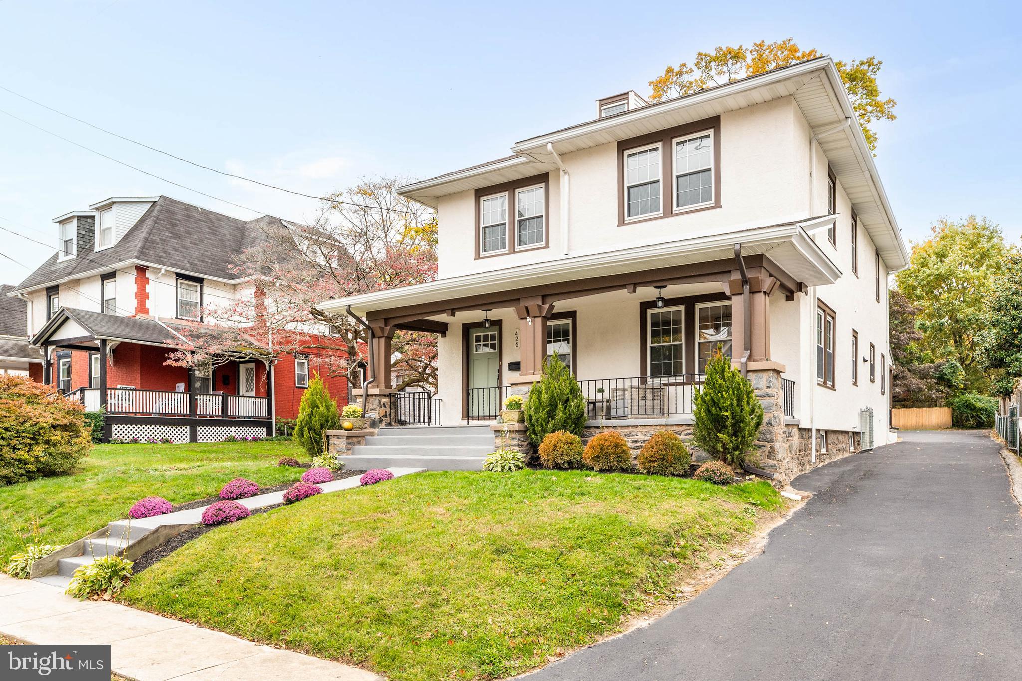 A rare opportunity in one of the Main Line’s most coveted locations, just a short walk to downtown Wayne, this beautifully restored turn-of-the-century home blends timeless charm with today’s modern comforts. Fully gutted and reimagined, it offers 4 bedrooms, 2.5 baths, and 2,300 square feet of light-filled living space.As you approach the home, an airy front porch graciously welcomes you, setting the tone for the inviting interior. The first floor is thoughtfully designed and offers amazing flow from the living room into the dining room, the brand-new kitchen, and on into the family room, all conveying a sense of warmth, connection, and functionality for everyday life or entertaining. Wide-plank oak floors, custom lighting, and abundant natural light create the perfect balance of style and comfort. The light and bright kitchen features quartz countertops, custom cabinetry, brass fixtures, stainless steel appliances, and a charming touch of exposed brick. The breakfast bar provides a casual spot for coffee or conversation, while the adjacent family room with a stone fireplace makes everyday life or entertaining effortless. A mudroom/laundry room completes the first floor and opens to a covered back porch overlooking the flat, spacious fenced in backyard. Upstairs, the primary suite includes a large walk-in closet and a luxurious ensuite bath with double vanity, water closet, and expansive shower. Three additional bedrooms and a neutral yet stylish hallway bath with the home’s original built-in storage nook adds both functionality and charm. Additional highlights include a two-car detached garage, ample driveway parking, a brand-new roof, and new HVAC system. Every detail has been thoughtfully updated, making this a truly turnkey home. All this in a prime location, minutes to downtown Wayne and all it has to offer, including Radnor Township schools, the train station, parks, shopping, restaurants, and major routes. An incredible opportunity to move right in and experience the best of Main Line living!