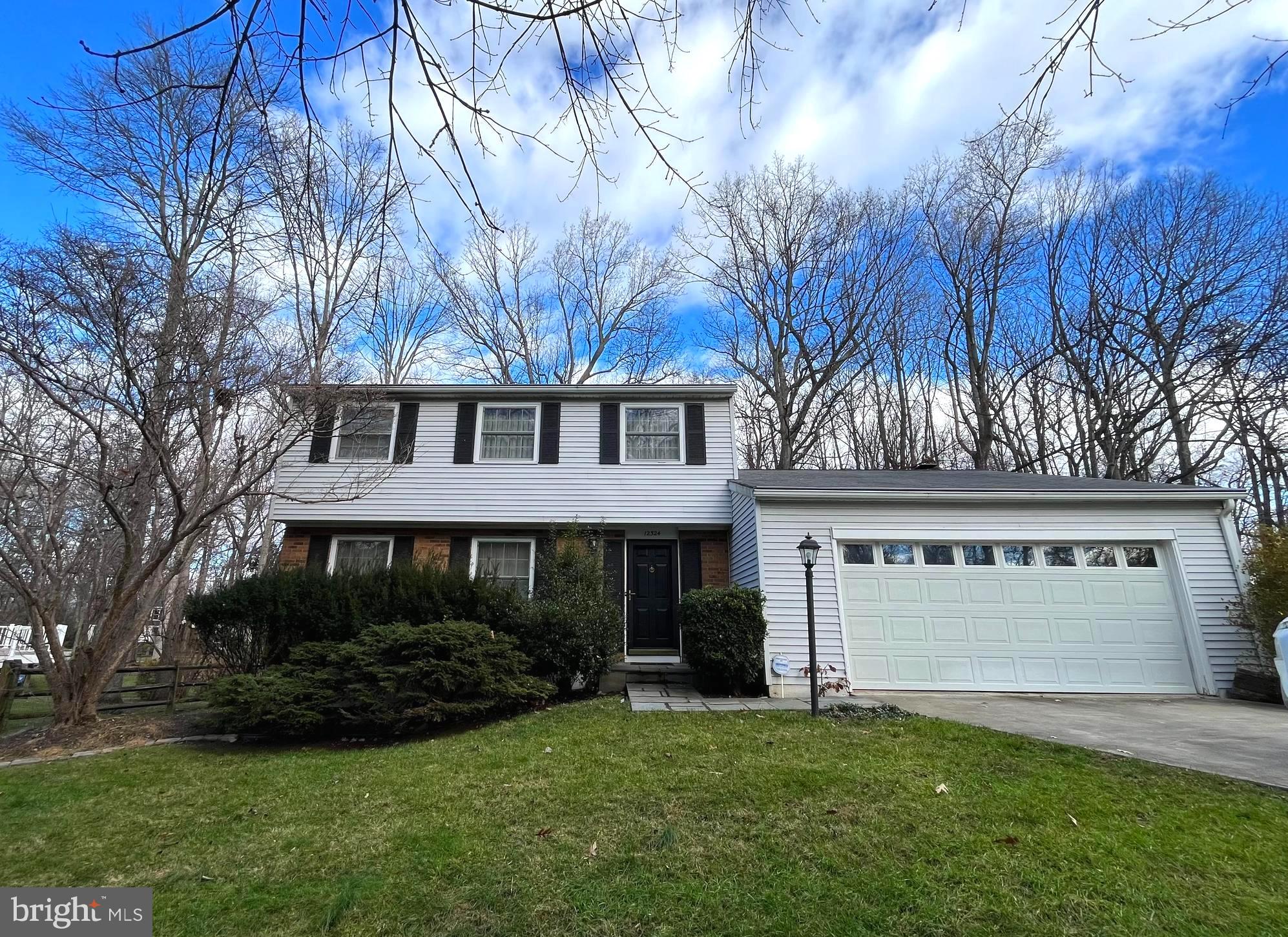 Welcome to this well-maintained home on a spacious wooded lot! The property boasts a concrete 6-car driveway and a charming flagstone walkway leading to the front door. Inside, the large kitchen features Silestone counters and stainless-steel appliances, with an adjacent breakfast room. The family room, complete with a fireplace and built-in decorative shelves, opens onto a large deck (252 Sqft) with stunning natural views. The formal living and dining rooms with hardwood floors add an elegant touch. The upper level with 3 bedrooms and 2 full baths provides comfortable living space. The unfinished basement, spanning over a thousand Sqft, provides a lot of potential for customization and creating your desired living space. Conveniently located minutes away from the toll road, Reston Town Center, and metro, this non-thru street property is a must-see.