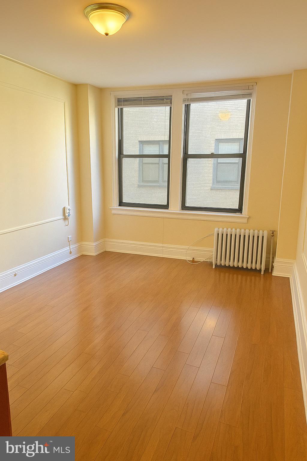 Come home to this bright and upgraded studio at the  Arts Condominium . This unit located in the center of it all features gleaming upgraded floors, an updated kitchenette, a ceramic tiled bathroom, and oversized windows which flood your space with an abundance of light. The condo fee covers ALL UTILITIES - water, gas, electric and internet! Building amenities include a state of the art fitness center, secured entry, a 24 hour lobby attendant, on-site bicycle parking, and on site laundry facilities. Located across from the Academy of Music and half a block from the Avenue of the Arts, this pet friendly residence is steps away from fine dining , one of a kind shopping, exciting nightlife and major transport.
