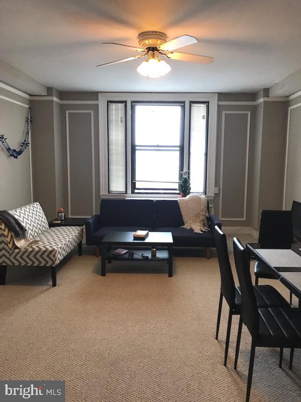 Corner 3 bedroom (or 2 bedroom plus den), 3 bathroom with 270 degree city views half a block from Rittenhouse Square! The residence features amazing natural light, an open living room with picture moldings on the walls, 10' ceilings, and large windows. The spacious  kitchen has white wood cabinets and plenty of counter space. The large dining room is perfect for entertaining guests.  The primary bedroom boasts large closets, carpeting throughout, ensuite bathroom with single vanity, and shower/tub combination. The second bedroom has a  walk-in closet, and ensuite bathroom with single vanity and shower/tub combination. There is an additional bonus space that can serve as a den or a small third bedroom with a third bathroom and a stackable washer/dryer. The Carlyle is a pet-friendly, doorman building only one block from Rittenhouse Square. Rent includes the security of a 24-hour doorman and use of the building's state-of-the-art gym. Tenants are responsible for paying all utilities. The Carlyle is a short walk from 175 restaurants, and over 199 retailers as well as the Market Street office corridor, The Avenue of the Arts and University City.