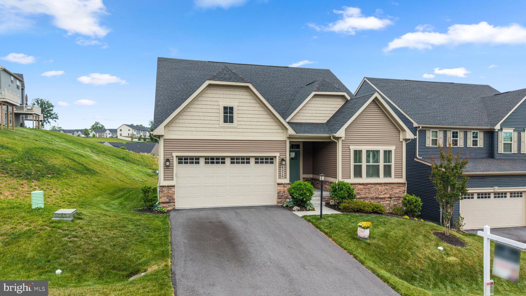Beautifully appointed ranch-style craftsman, newly built in 2023, offering 4 bedrooms, 3 full bathrooms, 2,696 finished square feet, and a 2-car garage in sought-after Lake Linganore. // Lush landscaping welcomes you inside, where gleaming LVP flooring flows throughout the main level. The foyer is flanked by a full bathroom and French doors opening to a private study or versatile flex space that could easily serve as a guest room. Continue into the open-concept great room, where a spacious family room seamlessly connects to the stunning eat-in kitchen. // Designed for both everyday living and entertaining, the kitchen showcases stainless steel appliances, quartz countertops, pendant lighting, white cabinetry, a custom backsplash, a large center island with breakfast bar seating, a pantry, and a cozy dining area with access to the screened porch. A conveniently located laundry room and mudroom with garage access enhance the home's functionality. // Single-level living continues with two carpeted bedrooms, including the luxurious primary suite featuring a tray ceiling, a walk-in closet, and a private ensuite bath with a dual-sink vanity and a glass-enclosed shower with a built-in bench. // The fully finished walk-out lower level expands the home's living space with a spacious recreation room, a fourth bedroom, and a full bathroom. An expansive unfinished area provides abundant storage space and endless possibilities for future customization. // Outdoor living is equally inviting with a screened rear porch that opens to an elevated composite deck overlooking the backyard, creating the perfect setting for relaxing or entertaining. // Residents of Lake Linganore enjoy access to an exceptional array of amenities, including baseball fields, scenic hiking and biking trails, boat dock access, a clubhouse, dog park, outdoor pools, tot lots and playgrounds, and basketball, pickleball, tennis, and volleyball courts, along with the community's signature lakes, beach access, swimming, and recreational areas.