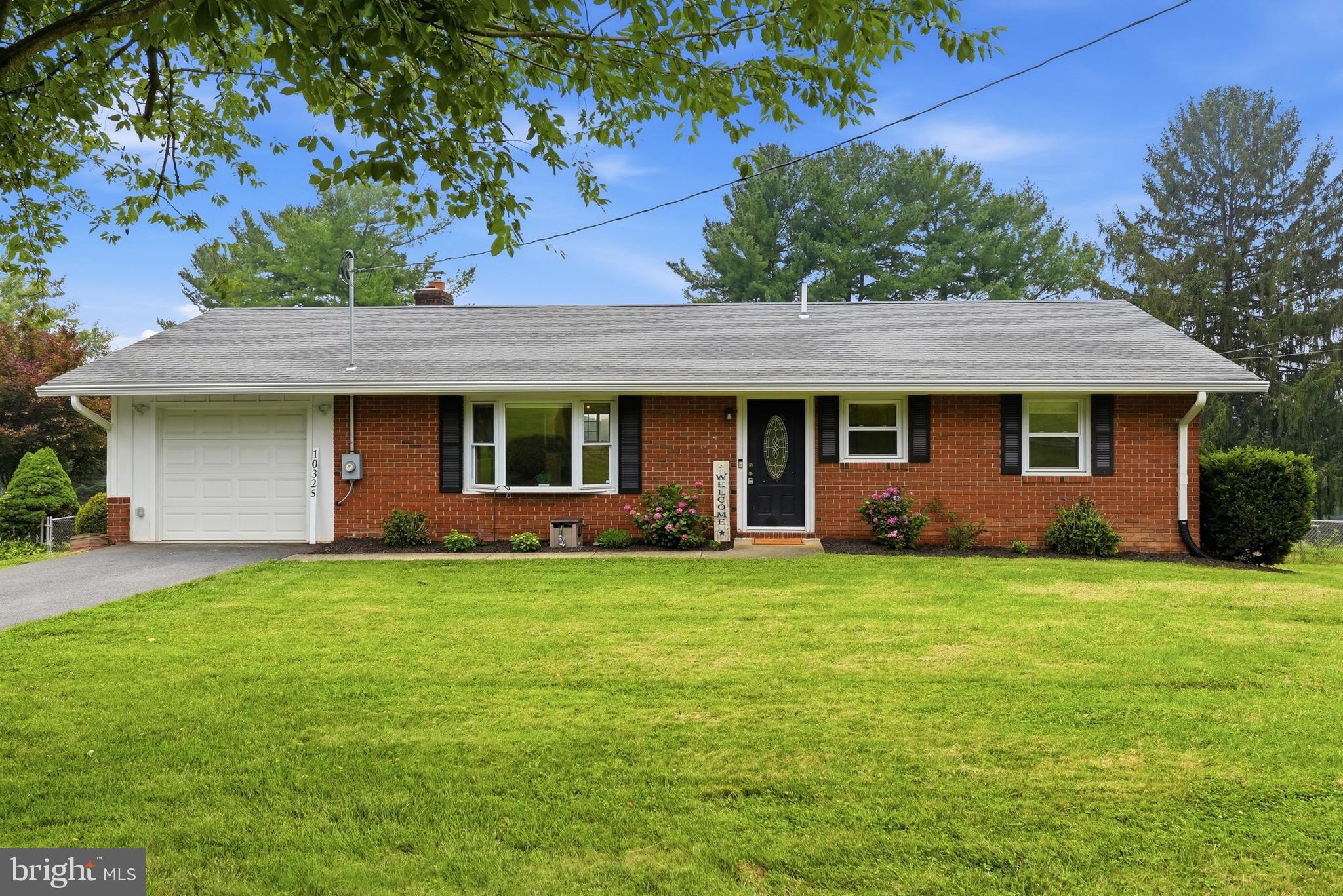 Welcome to 10325 Old Annapolis Rd, a beautifully renovated home offering the ease of main level living with over 2,200 square feet of living space. This 4 bedroom, 3 full bathroom home includes a spacious primary suite with a private bath.

Enjoy an open concept layout with a stunning custom kitchen complete with a large island, vaulted ceilings, granite countertops, stainless steel appliances, and scenic views from your kitchen sink. Hardwood floors run throughout the main level, paired with updated bathrooms, stylish finishes, and a cozy wood stove fireplace.

The fully finished lower level adds a large family room with brand new carpet , 4th bedroom and 3rd full bathroom, and walkout access to a patio and fenced backyard.

Major updates include newer HVAC, water heater, architectural roof, redone driveway, updated piping, and top of the line gutters.

Schedule your showing today!