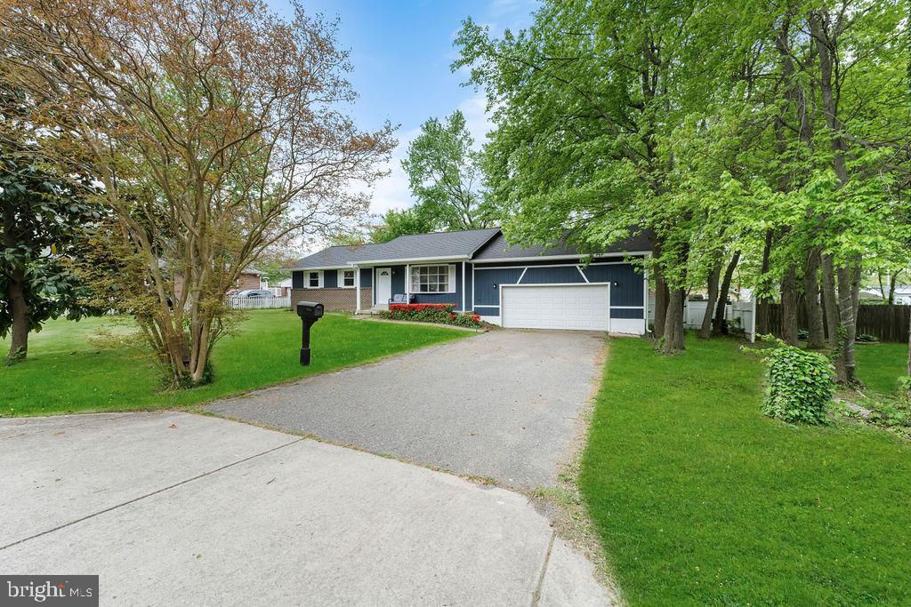 One level living at its best. Spacious rancher with eat in kitchen, large living room with hardwood floors. Renovated baths and kitchen. Two car garage. Nice yard, level and fully fenced in rear. Freshly painted inside and outside, new roof, gutters and downspouts. Cozy front porch. Deck in rear. All in move in condition.