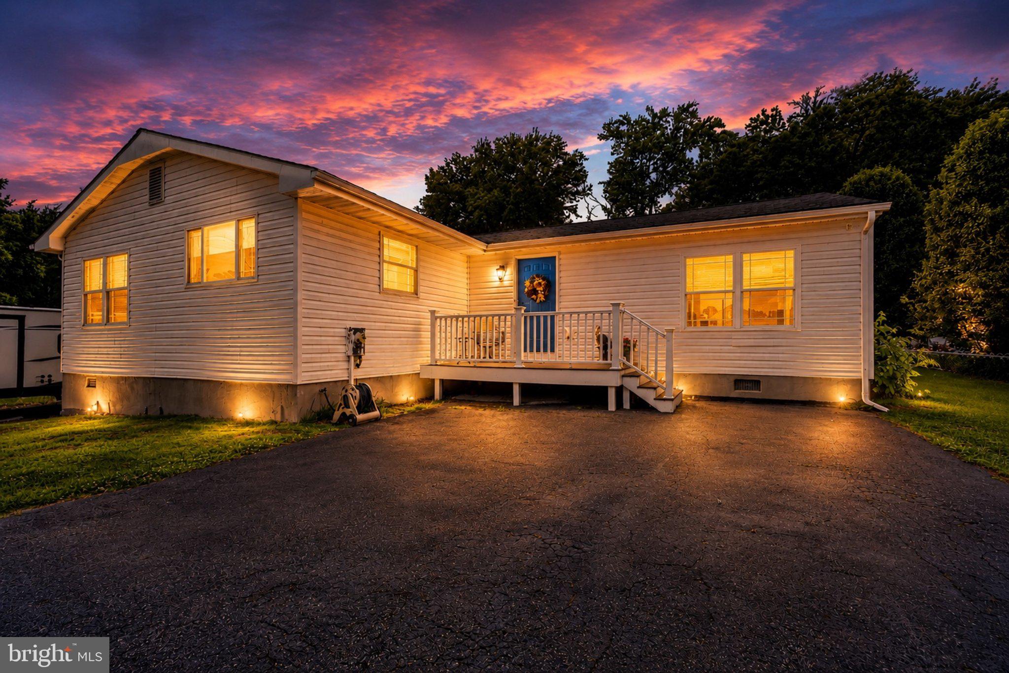 Welcome home to easy one level living! Enjoy the water views from the front of the home or the woods that the rear yard backs to- best of both worlds! This beautiful home offers 3 bedrooms, 2 full bathrooms, a large 24 x 24 living room, beautiful kitchen with double wall oven. Everything is on one floor. The unfinished basement offers plenty of storage space.  The basement has 6’ ceilings, a shower and a sink currently. This area can be finished and used as a club room, theater room , play room or whatever you may need.  Separate entrance to outside and connecting stairs to main level. Architectural shingle roof is 5 years new. Hvac is 8 years new.  Water heater 2019. This home sits on a double lot of .31 acre.